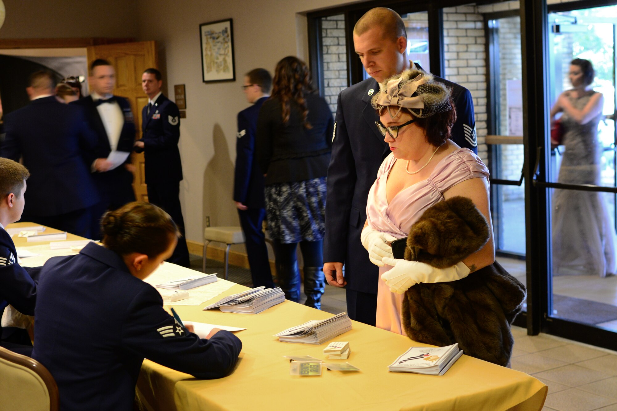 Guests in 1940s attire arrive at the Air Force Ball Sept. 20, 2014, at the Landing Zone at Cannon Air Force Base, N.M. The ball celebrated 67 years of Air Force history. (U.S. Air Force Photo/Airman 1st Class Shelby Kay-Fantozzi)