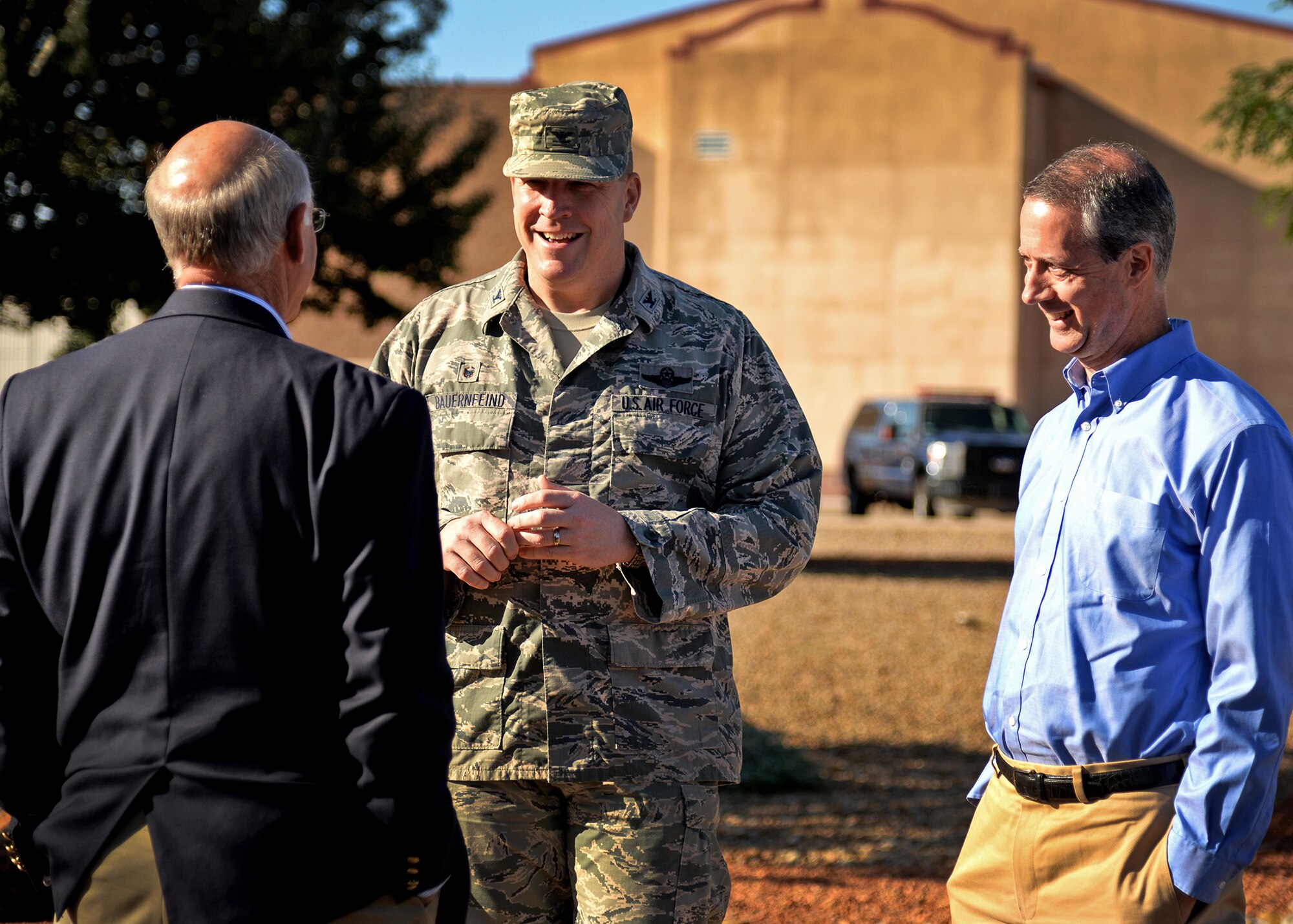 U.S. Air Force Col. Tony Bauernfeind, 27th Special Operations Wing commander, welcomes Reps. Mac Thornberry, House Armed Services Committee vice chairman, and Steve Pearce, House Financial Services member, Sept. 25, 2014 at Cannon Air Force Base, N.M. Both Thornberry and Pearce were given a firsthand experience of all that Team Cannon does on a daily basis. (U.S. Air Force photo/Airman 1st Class Chip Slack)