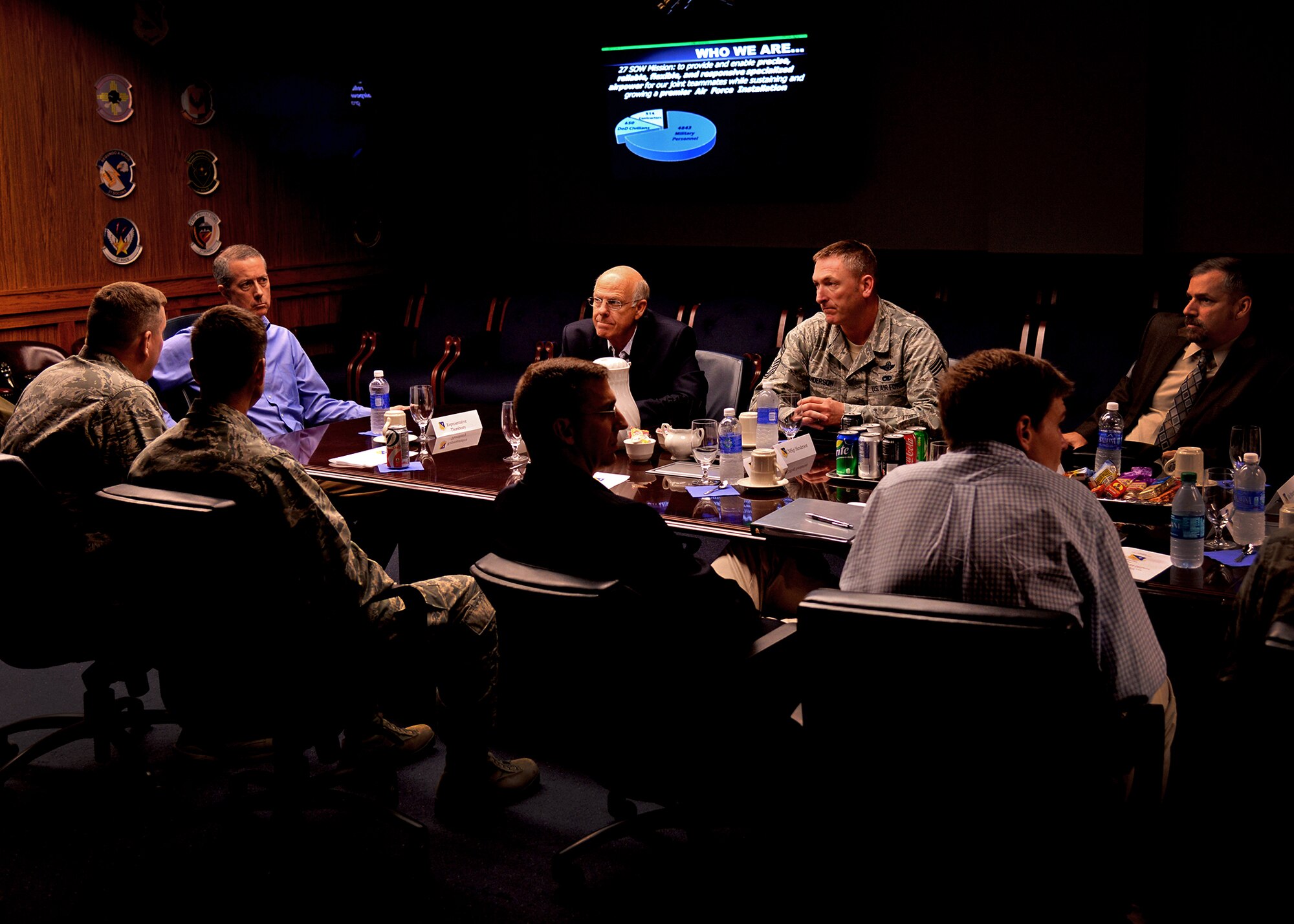 U.S. Reps. Mac Thornberry, House Armed Services Committee vice chairman, and Steve Pearce, House Financial Services member, sit down with U.S. Air Force Col. Tony Bauernfeind, 27th Special Operations Wing commander, and a selection of leaders Sept. 25, 2014 as they toured Cannon Air Force Base, N.M. Bauernfeind shared the 27 SOW mission statement and the impact that Team Cannon is having on the local community and Air Force as a whole. (U.S. Air Force photo/Airman 1st Class Chip Slack)