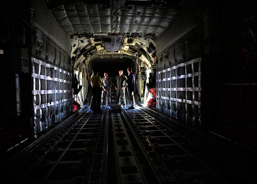 During their visit, Reps. Mac Thornberry, House Armed Services Committee vice chairman, and Steve Pearce, House Financial Services member, are given a tour of the powerful MC-130J Commando II model Sept. 25, 2014 at Cannon Air Force Base, N.M. Both Thornberry and Pearce were informed of the impressive statistics and capabilities of this aircraft, as well as the AC-130W and the U-28A during their visit. (U.S. Air Force photo/Airman 1st Class Chip Slack)