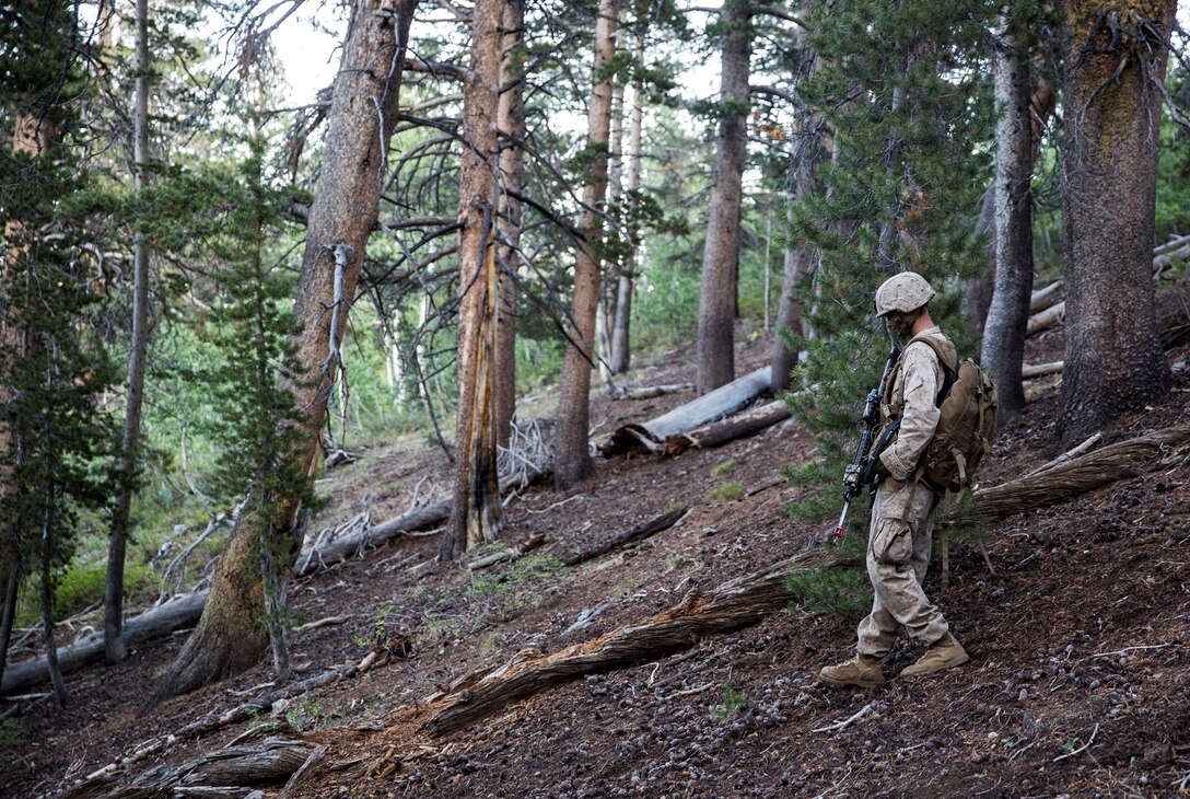 U.S. Marine Lance Cpl. Cody Carter conducts a water resupply during Mountain Exercise 2014 aboard Marine Corps Mountain Warfare Training Center in Bridgeport, Calif., Sept. 8, 2014. Carter, 19, from Iron River, Mich., infantry rifleman with 1st Platoon, Lima Company, 3rd Battalion, 1st Marine Regiment. Marines with 3/1 will become the 15th Marine Expeditionary Unit’s ground combat element in October. (U.S. Marine Corps photo by Sgt. Emmanuel Ramos/Released)