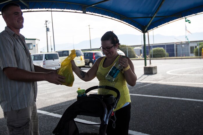 Marine Corps Air Station Iwakuni, Japan, residents participate in the 3rd annual Suicide Awareness 5K run/walk near Penny Lake fields aboard station, Sept. 27, 2014. The run was hosted by the Robert M. Casey Medical and Dental Health Clinic, the Marine Memorial Chapel and Behavioral Health. The event served as a way to help support  and raise awareness of those who are, and who have been, affected by suicide.