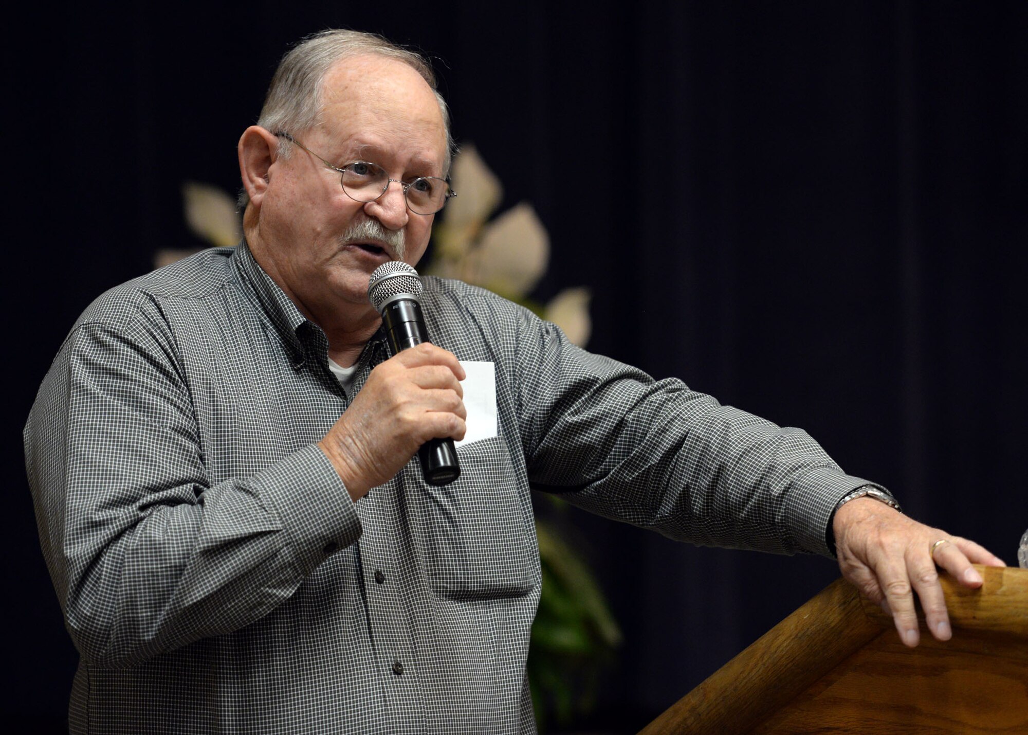 ALTUS AIR FORCE BASE, Okla. – Leon K. Pike, a U.S. Air Force veteran from the Vietnam era, briefs Airmen assigned to the 97th Air Mobility Wing during a 97th Civil Engineer Squadron heritage brief at the Freedom Community Center, Oct. 1, 2014. Pike spoke of his experiences while assigned to the 554th Rapid Engineer Deployable Heavy Operational Repair Squadron Engineer Squadron from 1971-1972. RED HORSE is a highly mobile self-sustaining unit that encompasses its own services personnel, security forces and vehicle maintenance. (U.S. Air Force photo by Senior Airman Franklin R. Ramos/Released)