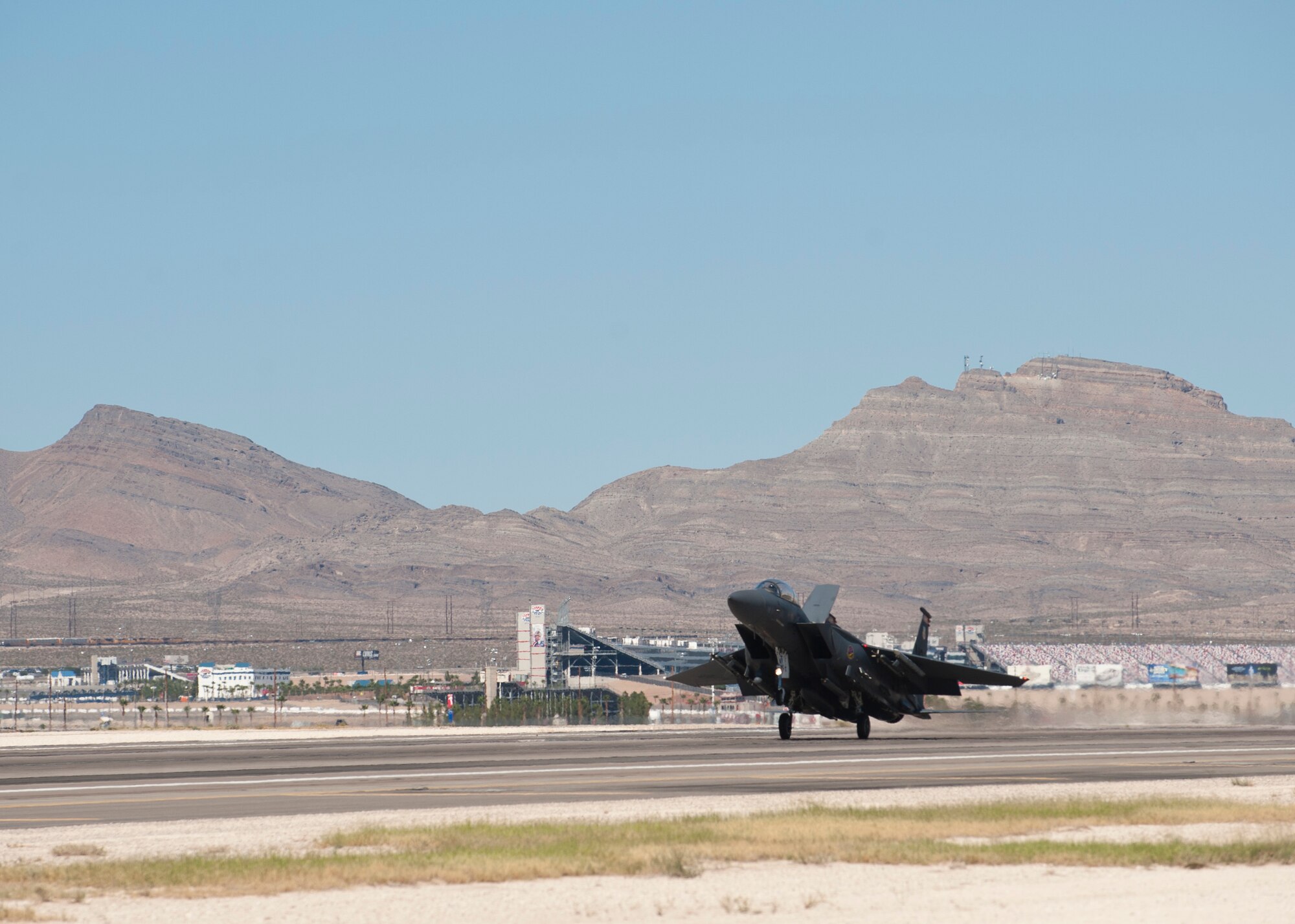 A U.S. Air Force F-15E Strike Eagle assigned to the 389th Fighter Squadron, Mountain Home Air Force Base, Idaho, lands during Green Flag West 14-10 at Nellis AFB, Nev., Sept. 24, 2014. The F-15s provided close air support for ground troops and defended maritime assets off the coast of Southern California. (U.S. Air Force photo by Airman 1st Class Thomas Spangler) 
