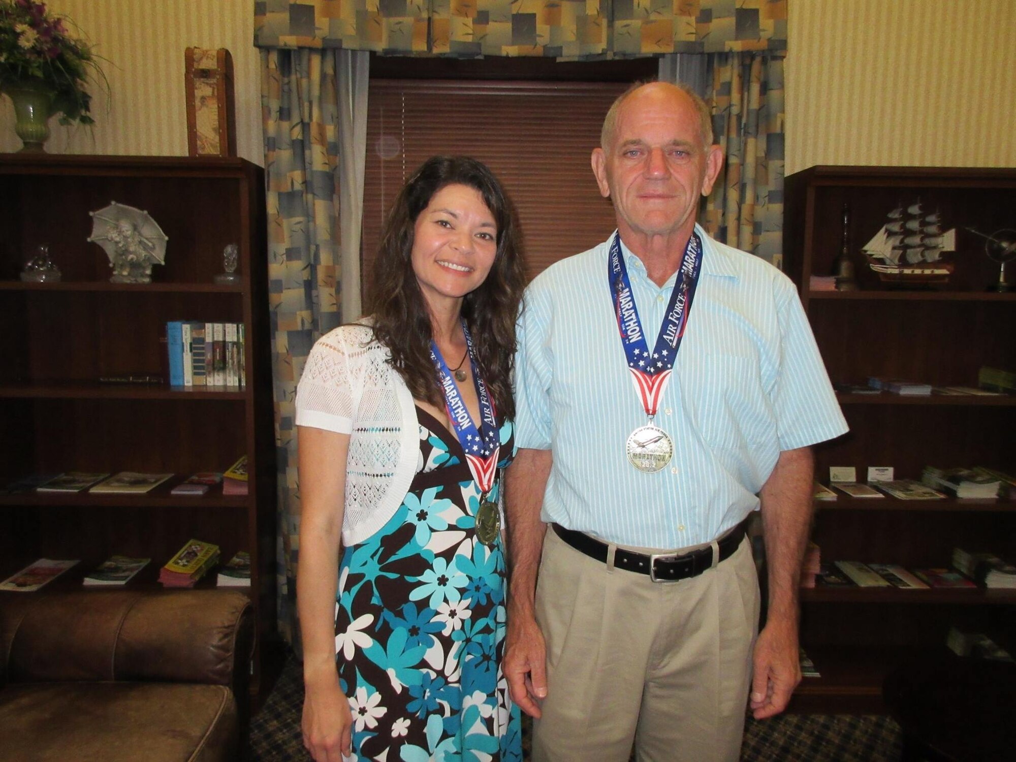 Lt. Col. Belinda Petersen, ARPC Director of Public Affairs, with her fellow runner and father, Maj. (ret.) Ron Teter, after completing the 2014 U.S. Air Force Marathon.