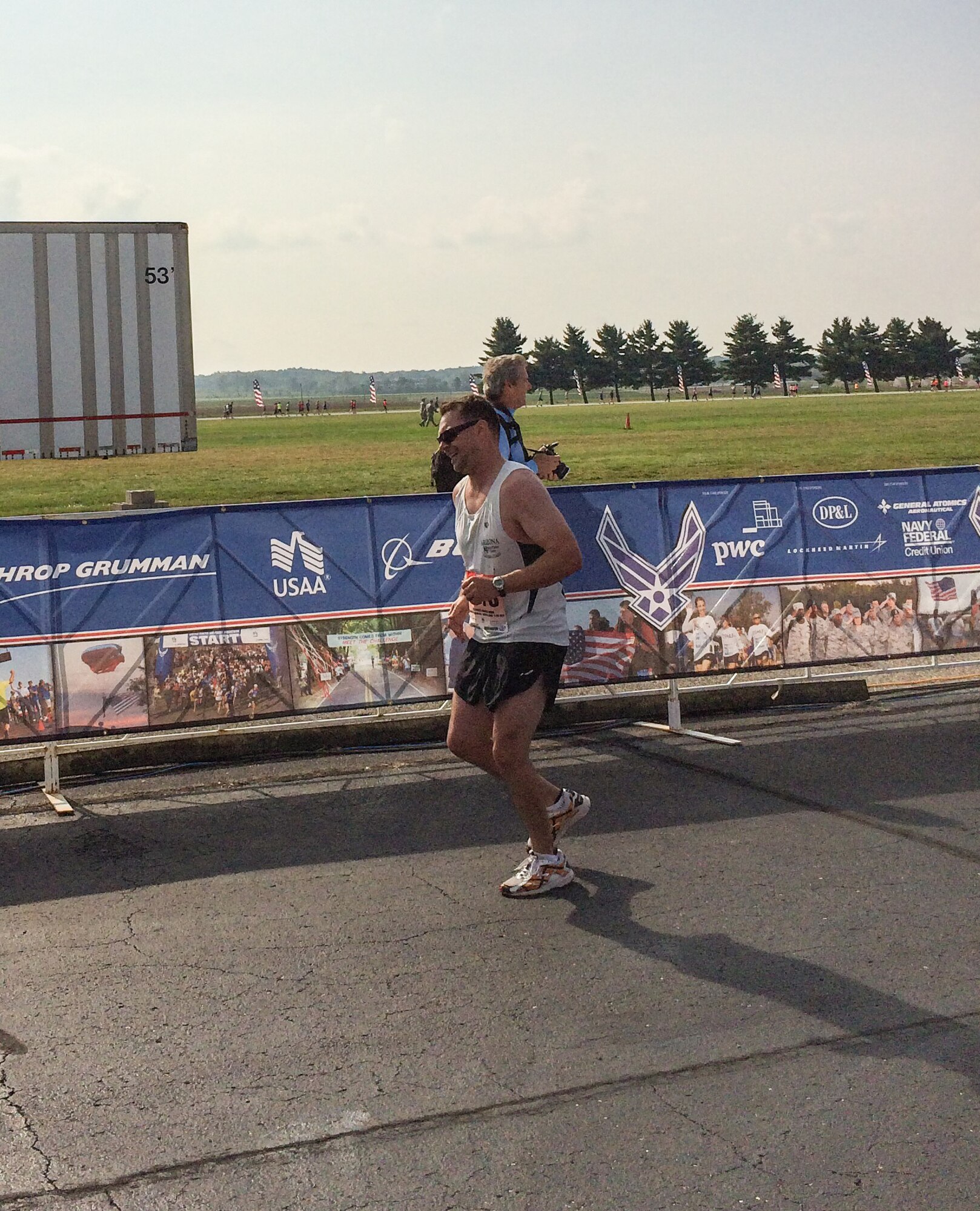 Staff Sgt. Luke Mostoller, Headquarters Individual Reservist Readiness and Integration Organization finance, runs the final steps of the 2014 U.S. Air Force Marathon. (Courtesy photo)