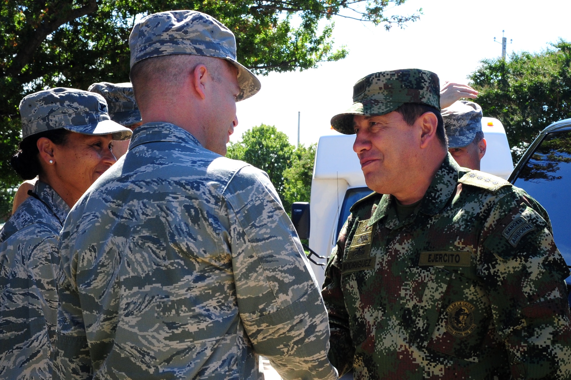 U.S. Air Force Col. Timothy D. Haugh, 480th Intelligence, Surveillance and Reconnaissance Wing commander, greets Colombian Gen. Juan Pablo Rodriguez, Armed Forces, Colombia commander at Langley Air Force Base, Va., Sept.26, 2014. Rodriguez visited Langley as a guest of the U.S. Army Gen. Martin E. Dempsey, Chairman of the Joint Chiefs of Staff.(U.S. Air Force Photo by Airman 1st Class Areca T. Wilson/Released) 