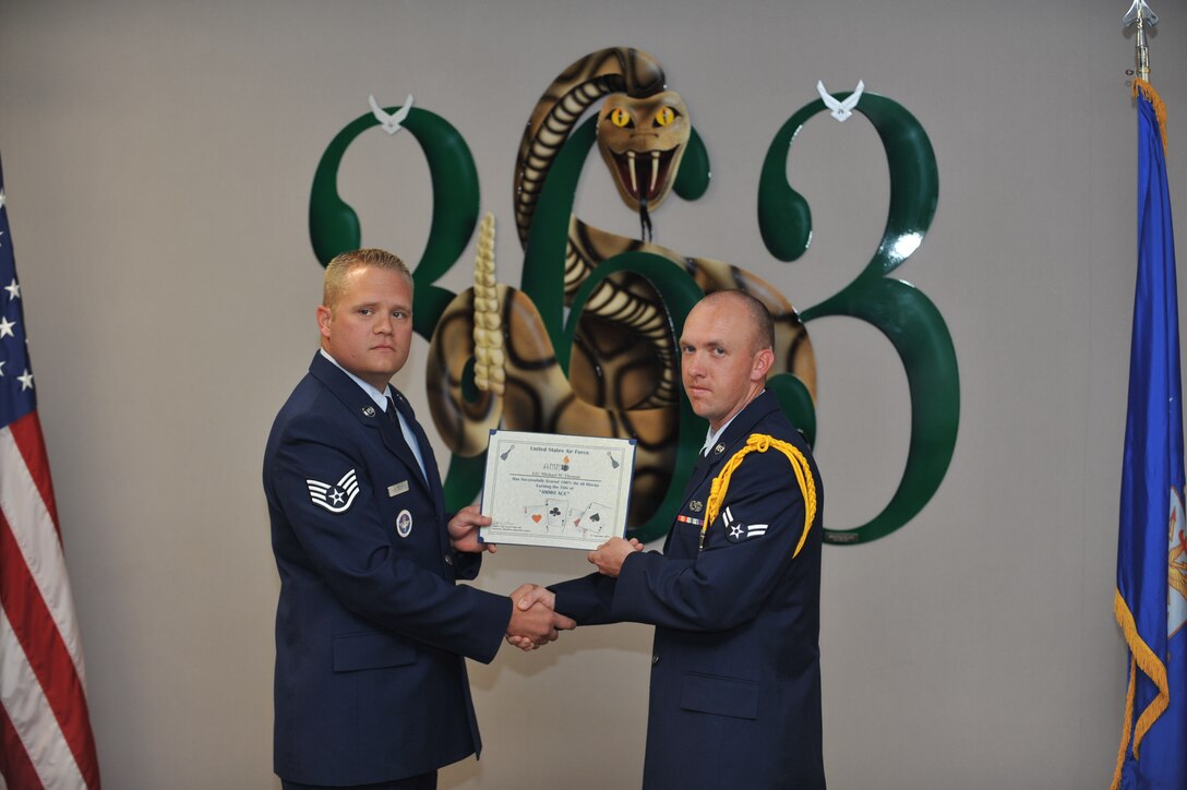 Airman 1st Class Michael Thomas, 363rd Training Squadron munitions systems apprentice course graduate, was one of the two Airmen in his class to maintain a perfect score throughout the entire course, earning him the coveted ACE award. (U.S. Air Force photo/Airman 1st Class Robert L. McIlrath)