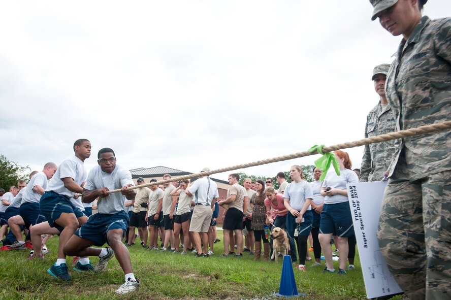 The 23d Component Maintenance Squadron team gains ground during a Super Sports Day tug of war  Sept. 30, 2014, at Moody Air Force Base, Ga. Super Sports Day was held in conjunction with Comprehensive Airman Fitness Day, this time focusing on the physical pillar. (U.S. Air Force photo by Senior Airman Jarrod Grammel/Released)
