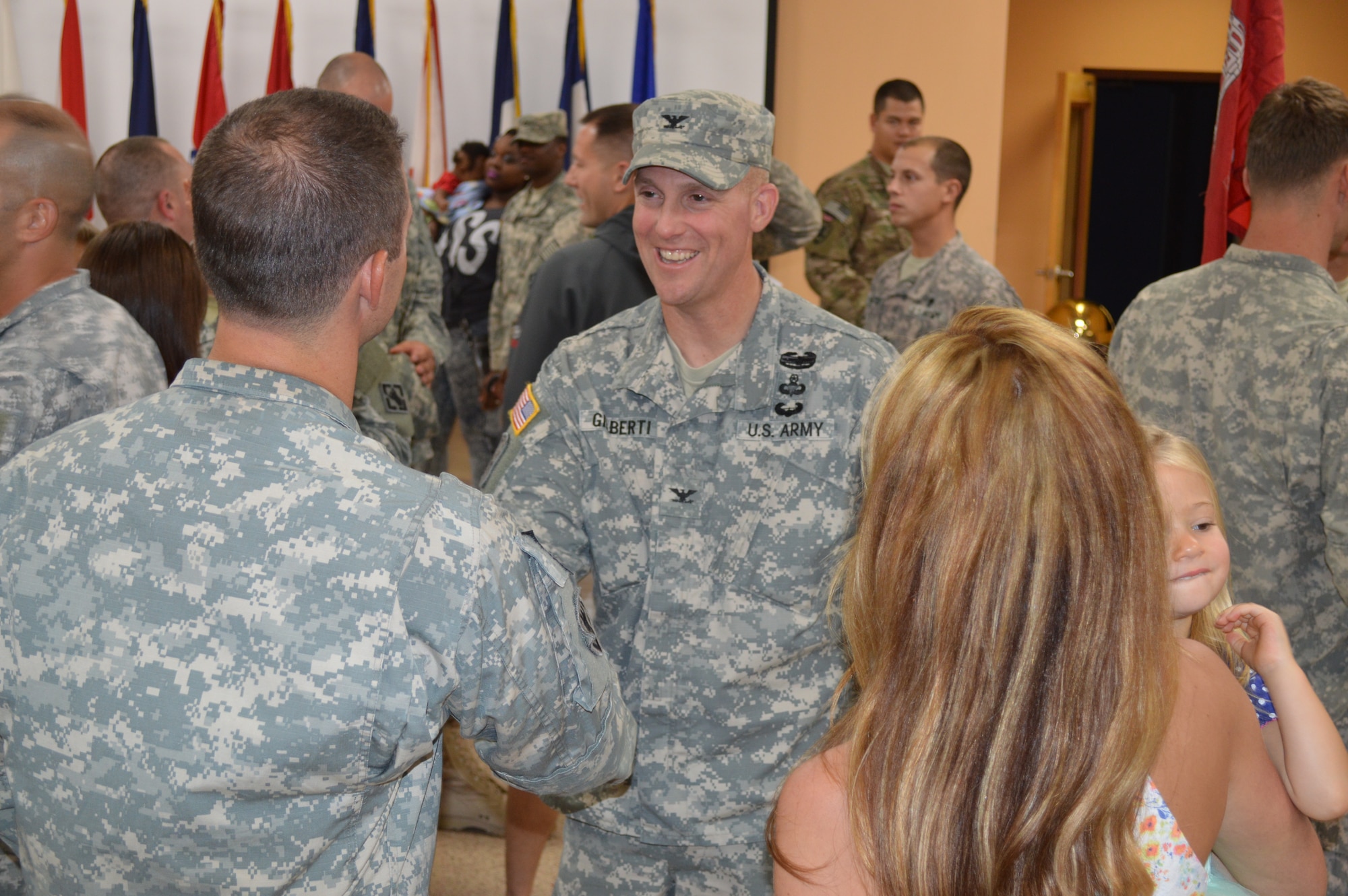 U.S. Army Soldiers assigned to the 511th Engineer Detachment and the 384th Movement Control Team, 53rd Transportation Battalion Movement Control, 7th Transportation Brigade (Expeditionary), are greeted by loved ones during a re-deployment ceremony at Fort Eustis, Va., Sept. 29, 2014. The two units returned from deployments in support of Operation Enduring Freedom. (U.S. Army photo by Spc. Marian Alleva/Released)