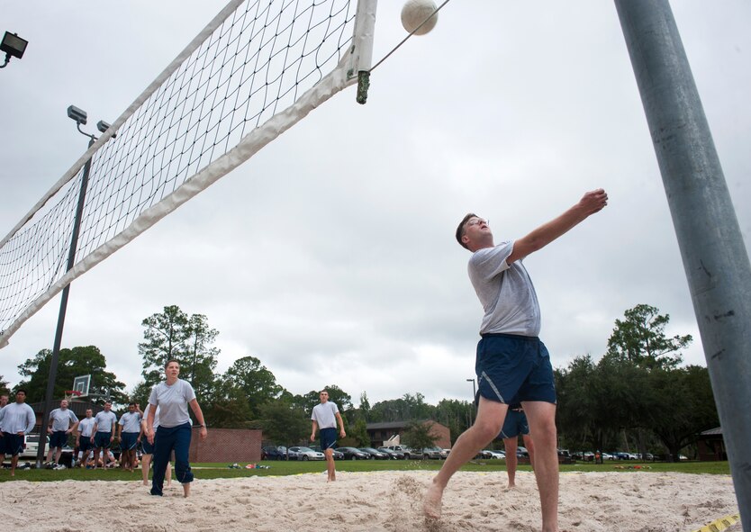 Brian Balcolm, 347th Operations Support Squadron, bumps the ball during a Super Sports Day volleyball game Sept. 30, 2014, at Moody Air Force Base, Ga. The 347th OSS won this game 24-23. (U.S. Air Force photo by Senior Airman Jarrod Grammel/Released)
