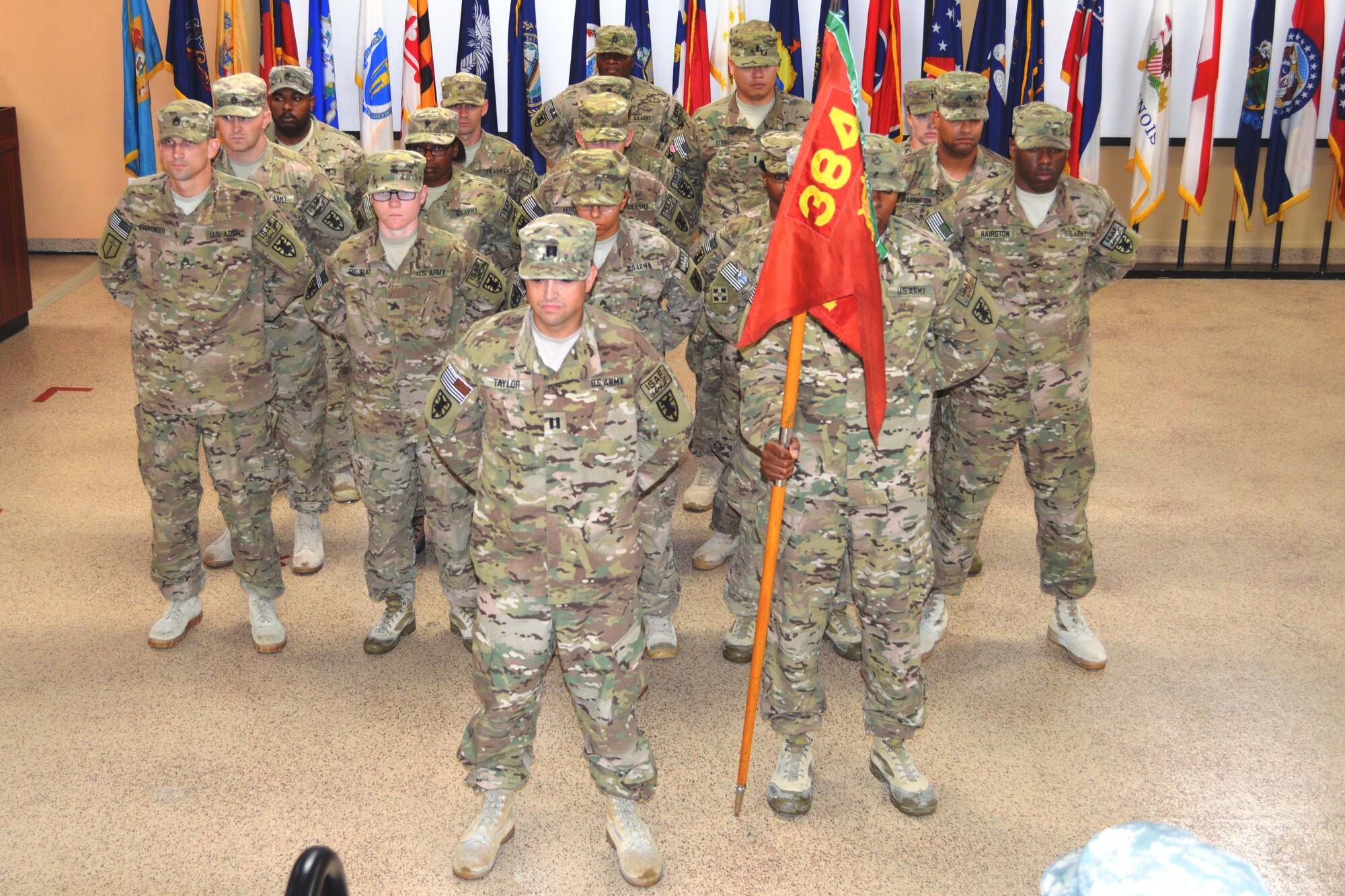U.S. Army Soldiers assigned to the 384th Movement Control Team, 53rd Transportation Battalion, 7th Transportation Brigade (Expeditionary), stand in formation during a re-deployment ceremony at Fort Eustis, Va., Sept. 29, 2014. The 21-person team conducted movement control operations by planning and coordinating the movement of personnel and cargo at multiple locations while deployed in support of Operation Enduring Freedom. (U.S. Army photo by Spc. Marian Alleva/Released)