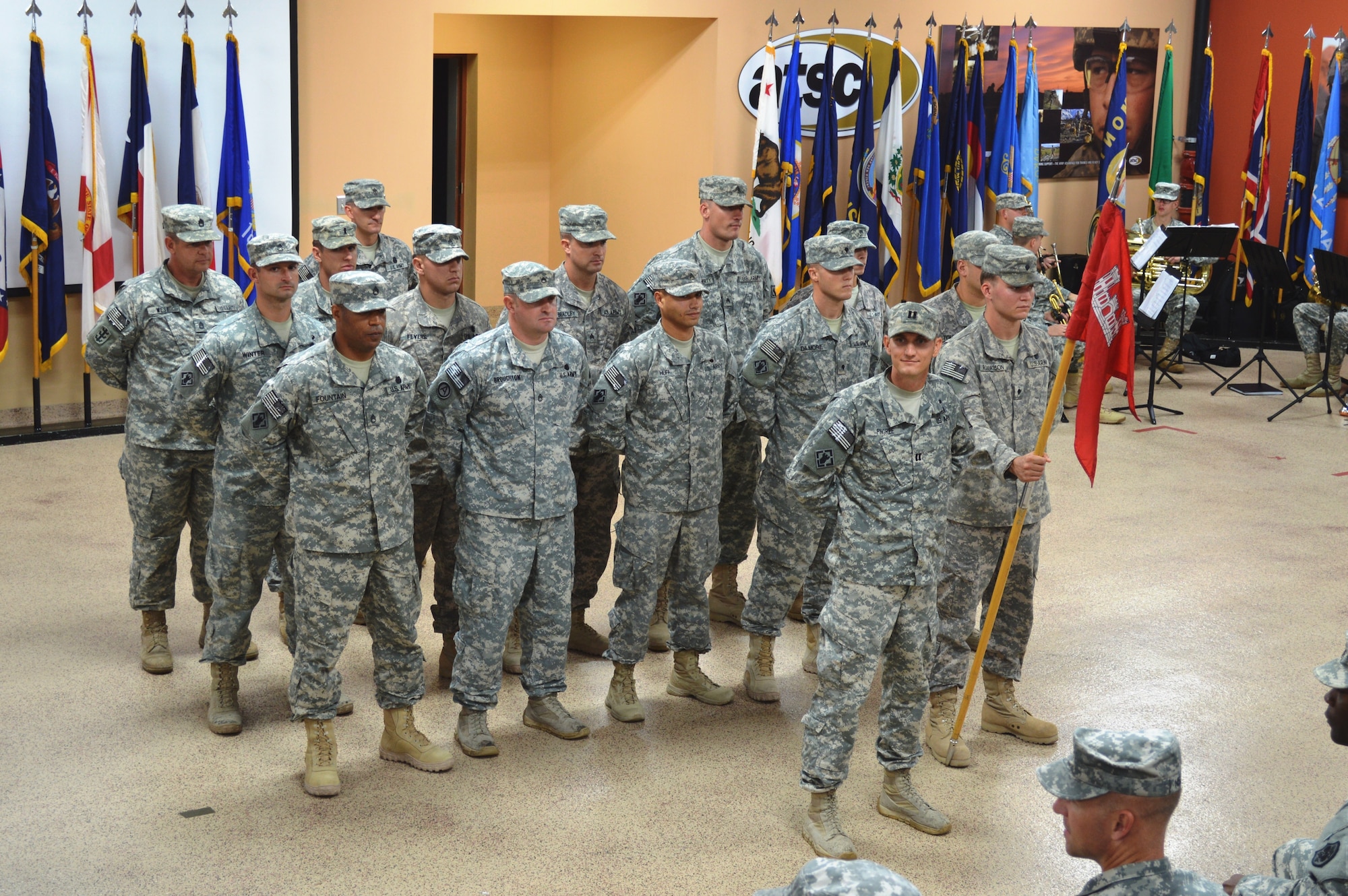 U.S. Army Soldiers assigned to the 511th Engineer Detachment, 53rd Transportation Battalion Movement Control, 7th Transportation Brigade (Expeditionary), stand in formation during a re-deployment ceremony at Fort Eustis, Va., Sept. 29, 2014. The 15-person team conducted deep sea engineering operations by repairing and servicing various vessels and other equipment while deployed in support of Operation Enduring Freedom. (U.S. Army photo by Spc. Marian Alleva/Released)