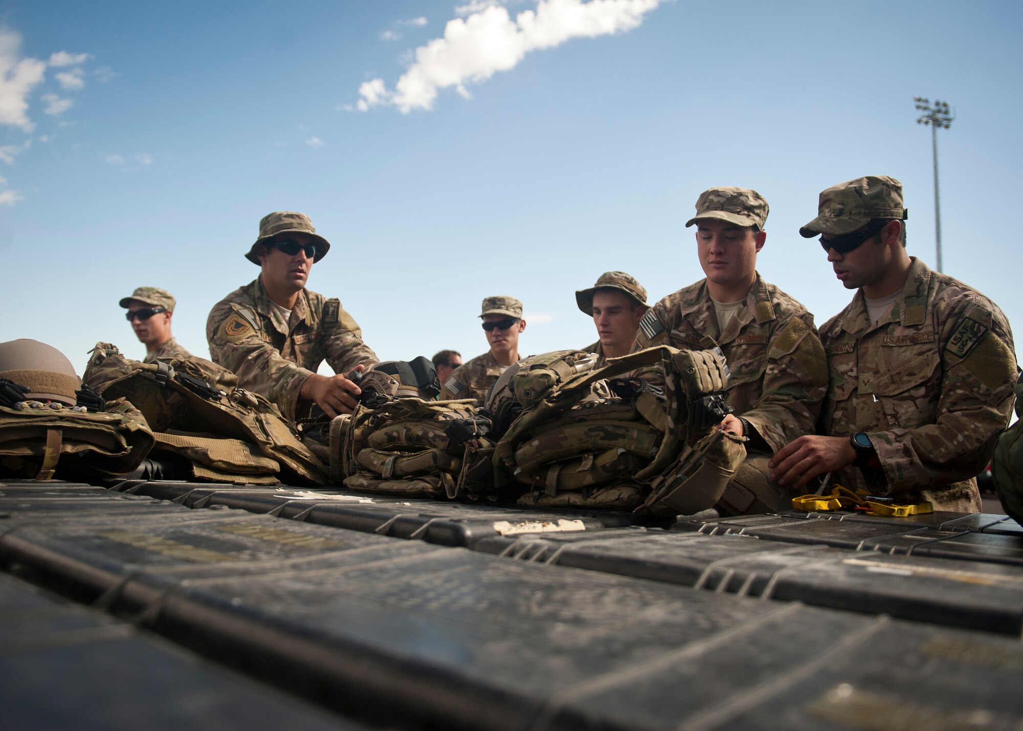 Pararescuemen from the 58th Rescue Squadron pack their gear onto a pallet before deploying to Southwest Asia at Nellis Air Force Base, Nev., Sept. 26, 2014. Pararescuemen go through a rigorous two-year training pipeline to prepare them for the intensity of future real-world rescue missions they will be a part of. (U.S. Air Force photo by Staff Sgt. Siuta B. Ika)
