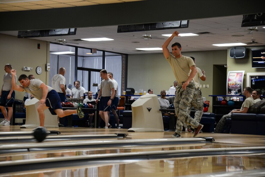 Justin Krenzelok, 38th Rescue Squadron NCO in charge of combat arms training and maintenance, bowls during Super Sports Day Sept. 30, 2014 at Moody Air Force Base, Ga. Super Sports Day events included basketball, sand volley ball and golf. (U.S. Air Force photo by Senior Airman Sandra Marrero/Released)
