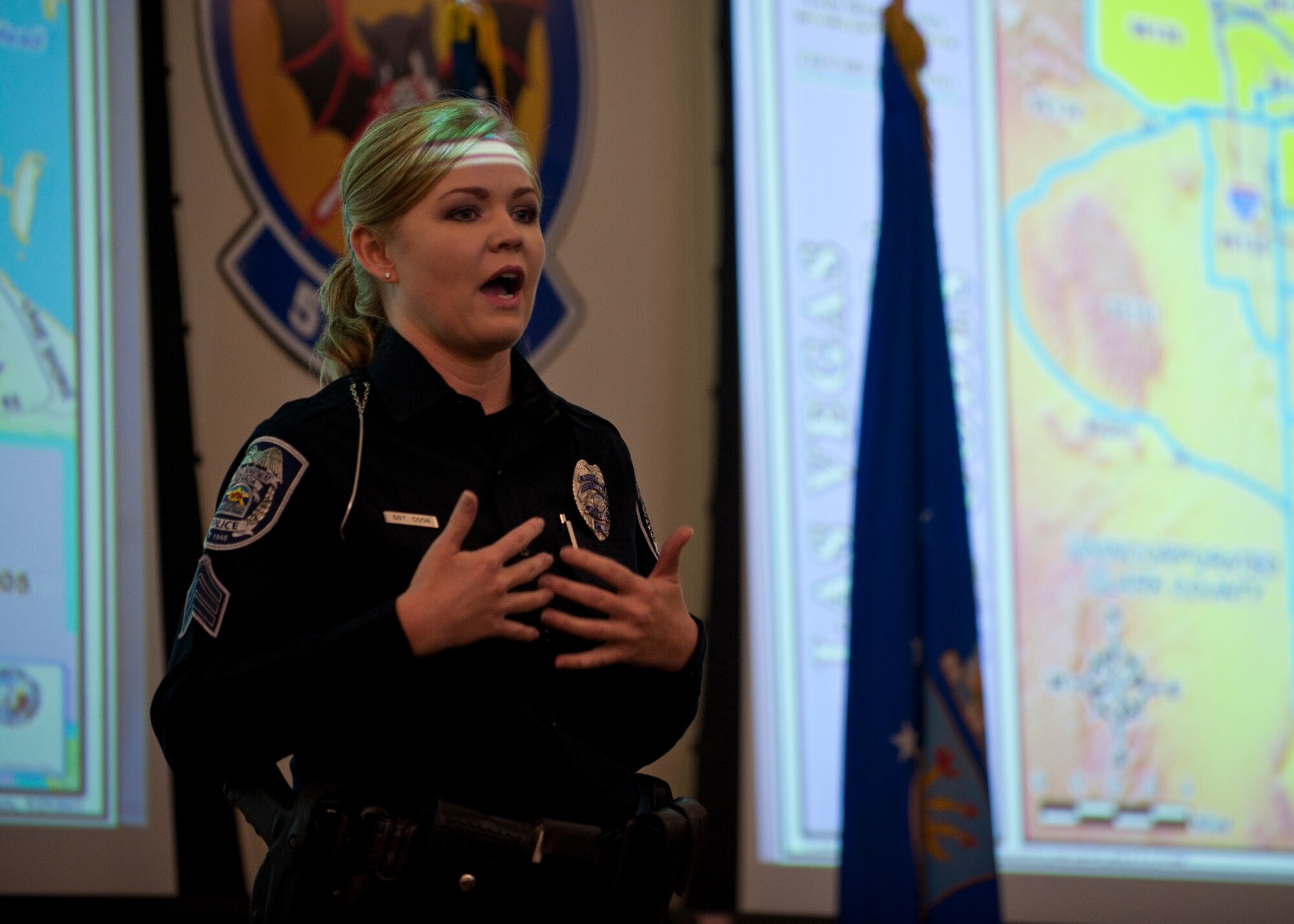 North Las Vegas Police Department Sgt. Chrissie Coon speaks to members of base leadership during a behavioral health leadership forum at Nellis Air Force Base, Nev., Sept. 30, 2014. Coon spoke to installation leadership about the challenges unique to Nellis-assigned Airmen living in the region and the dangers posed to all residents and law enforcement agencies in the Las Vegas metropolitan area. (U.S. Air Force photo by Staff Sgt. Siuta B. Ika)