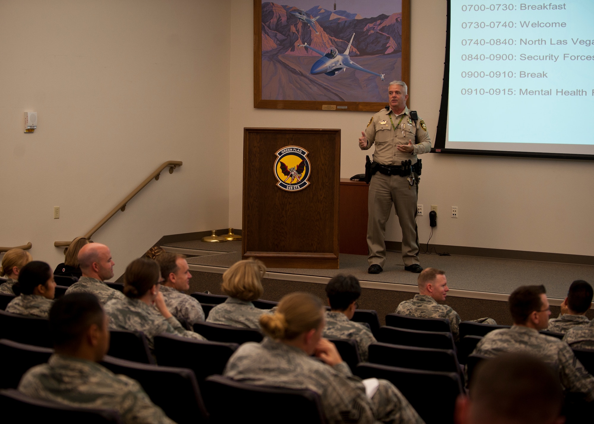 Las Vegas Metropolitan Police Department Capt. Rich Fletcher, Northeast Area commander, speaks to members of base leadership during a behavioral health leadership forum at Nellis Air Force Base, Nev., Sept. 30, 2014. During the forum, representatives from LVMPD, North Las Vegas Police Department, and Clark County Child Protection Services met with squadron, group and wing from around the base to discuss their roles and procedures in dealing with Nellis-assigned personnel who are involved in off-base incidents. (U.S. Air Force photo by Staff Sgt. Siuta B. Ika)