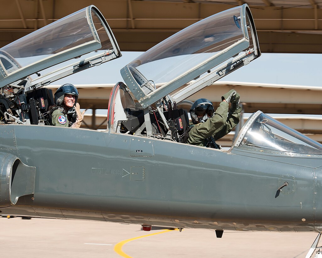 Col. Lance Bunch, 80th Flying Training Wing commander, and his wife Emily
participated in the Spouse Flight and Taxi Orientation Program at Sheppard
Air Force Base, Texas, Sept. 30, 2014. Family members are critical to the Air Force team. This event for spouses displayed the unit aircraft and mission to enhance their understanding of their military member's contribution to the Air Force mission. (U.S. Air Force Photo Danny Webb/Released)
