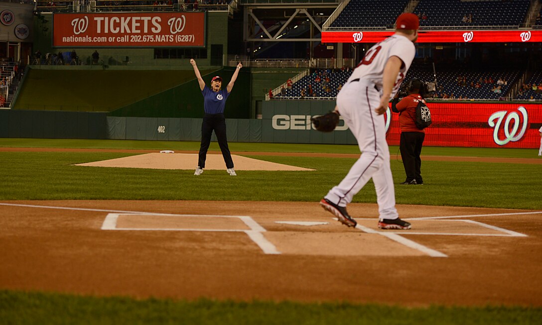 Secretary of the Air Force Deborah Lee James throws the first pitch during the Nationals' "Air Force Salute" at Nationals Park, Washington, D.C., Sept. 25, 2014.  Inaddition to James' first pitch, the Nationals celebrated the Air Force birthday with Air Force Chief of Staff Gen. Mark A. Welsh III delivering the first ball, and approximately 50 Airmen lined the field to open the game.  (U.S. Air Force photo/Scott M. Ash)