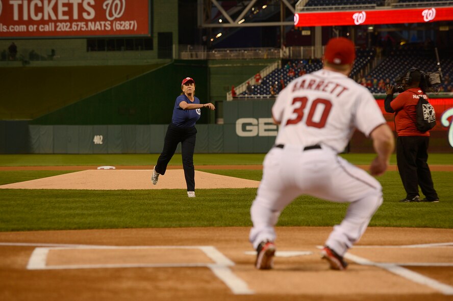 Secretary of the Air Force Deborah Lee James throws the first pitch during the Nationals' "Air Force Salute" at Nationals Park, Washington, D.C., Sept. 25, 2014.  Inaddition to James' first pitch, the Nationals celebrated the Air Force birthday with Air Force Chief of Staff Gen. Mark A. Welsh III delivering the first ball, and approximately 50 Airmen lined the field to open the game.  (U.S. Air Force photo/Scott M. Ash)