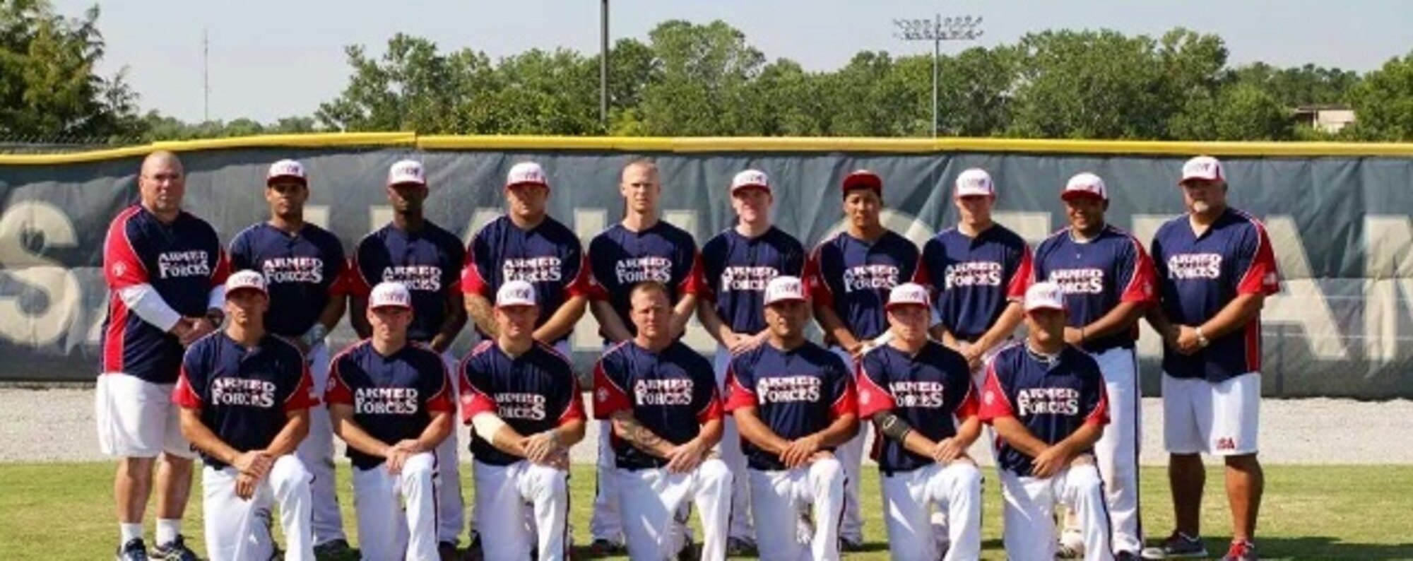The 2014 All Armed Forces softball team pose a group photo. (courtesy photo)