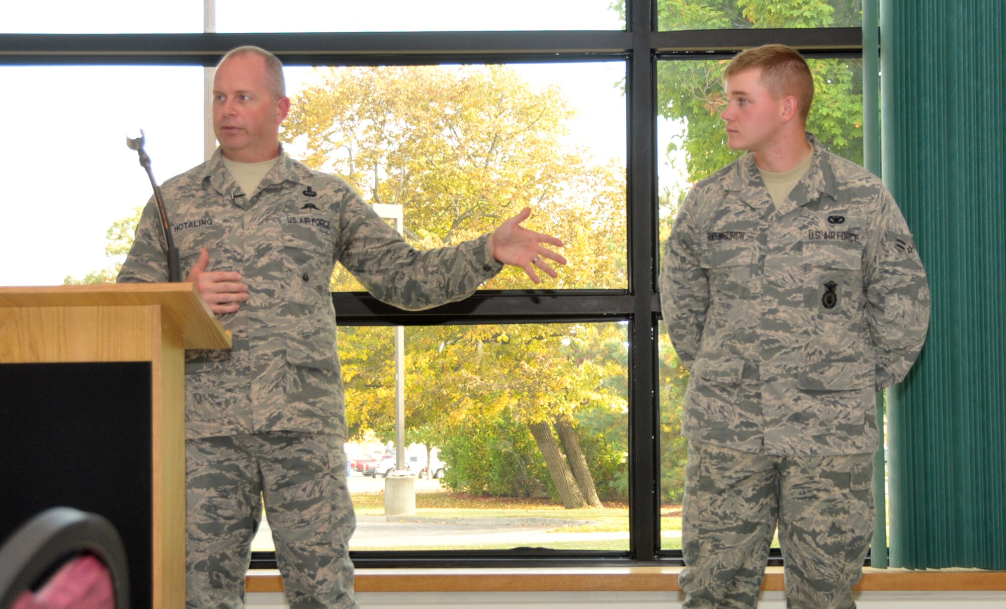 Command Chief Master Sgt. of the Air National Guard James Hotaling held an enlisted town hall meeting during a visit to Stratton Air National Guard Base, New York, on Sept. 30, 2014. He brought up the newest Airman in the audience, Airman 1st Class Trevor Rivenburgh of the 109th Security Forces Squadron, to remind the audience of the pride earned when becoming an Airman. He was at the base in preparation for an upcoming trip to Antarctica with the 109th Airlift Wing in support of Operation Deep Freeze. This will be his first trip to the ice. (U.S. Air National Guard photo by Master Sgt. William Gizara/Released)
