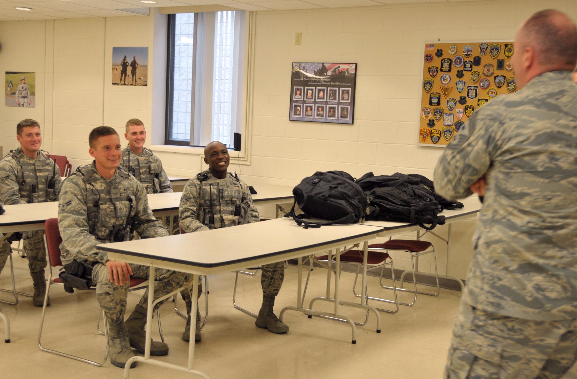 Command Chief Master Sgt. of the Air National Guard James Hotaling talks to a group of new Airmen with the 109th Security Forces Squadron during a visit to Stratton Air National Guard Base, New York, on Sept. 30, 2014. Hotaling visited Airmen throughout the base and also held an enlisted town hall meeting. He was at the base in preparation for an upcoming trip to Antarctica with the 109th Airlift Wing in support of Operation Deep Freeze. This will be his first trip to the ice. (U.S. Air National Guard photo by Tech. Sgt. Catharine Schmidt/Released)
