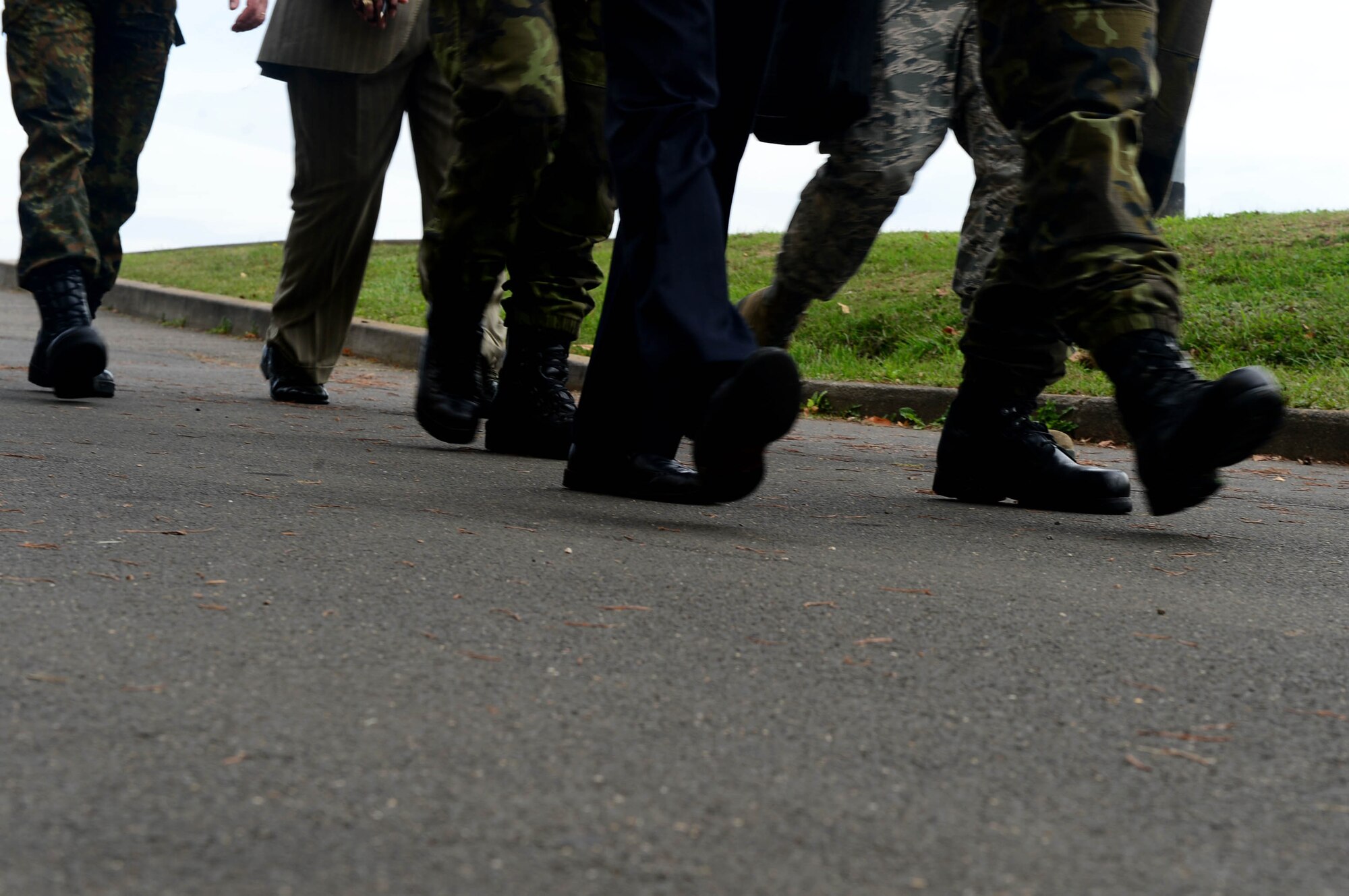 Inspectors from the Conventional Armed Forces in Europe treaty verification team walk to different buildings during an exercise at Spangdahlem Air Base, Germany, Sept. 29, 2014. The Czech Republic and France inspected the installation as part of a treaty verification exercise hosted by the 52nd Fighter Wing. (U.S. Air Force photo by Airman 1st Class Kyle Gese/Released)
