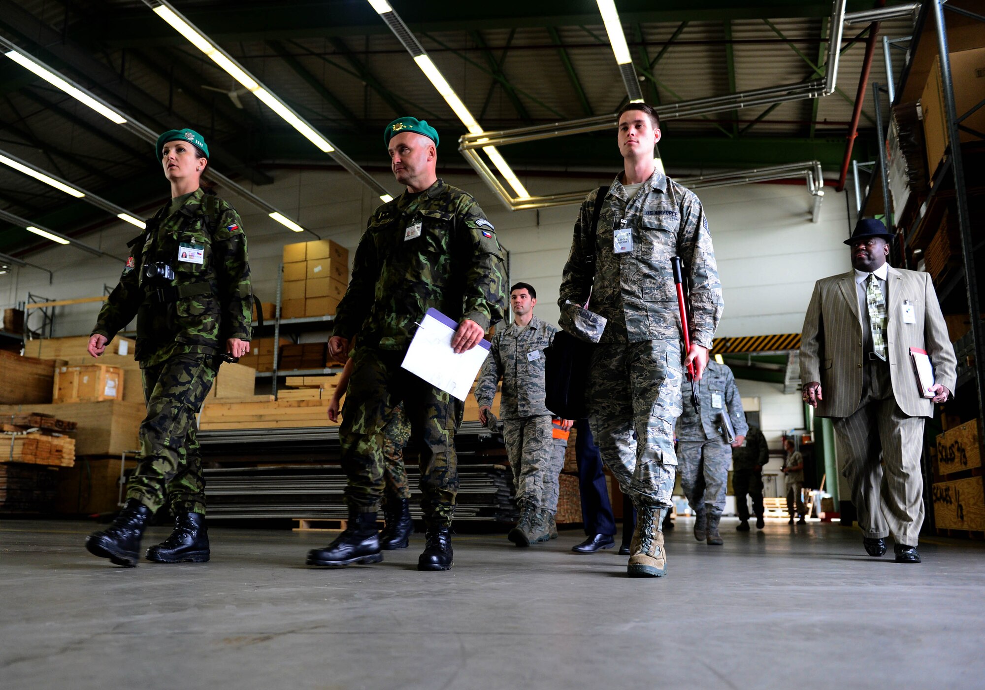 Inspectors from the Conventional Armed Forces in Europe treaty verification team walk through buildings during an exercise at Spangdahlem Air Base, Germany, Sept. 29, 2014. The inspectors visited the base as part of an exercise hosted by the 52nd Fighter Wing. The U.S. Air Force invited service members from both the Czech Republic and France to take part in the inspection exercise as the treaty verification team. The inspectors determined the U.S. Air Force’s compliance with CFE treaty regulations. (U.S. Air Force photo by Airman 1st Class Kyle Gese/Released)