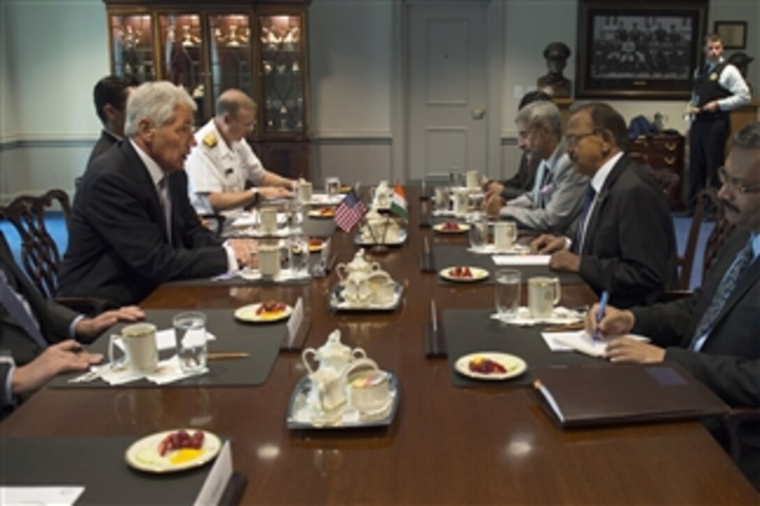 U.S. Defense Secretary Chuck Hagel, left, meets with Indian National Security Adviser Ajit Doval, second from right, at the Pentagon, Oct. 1, 2014. The two leaders met to discuss issues of mutual importance. 