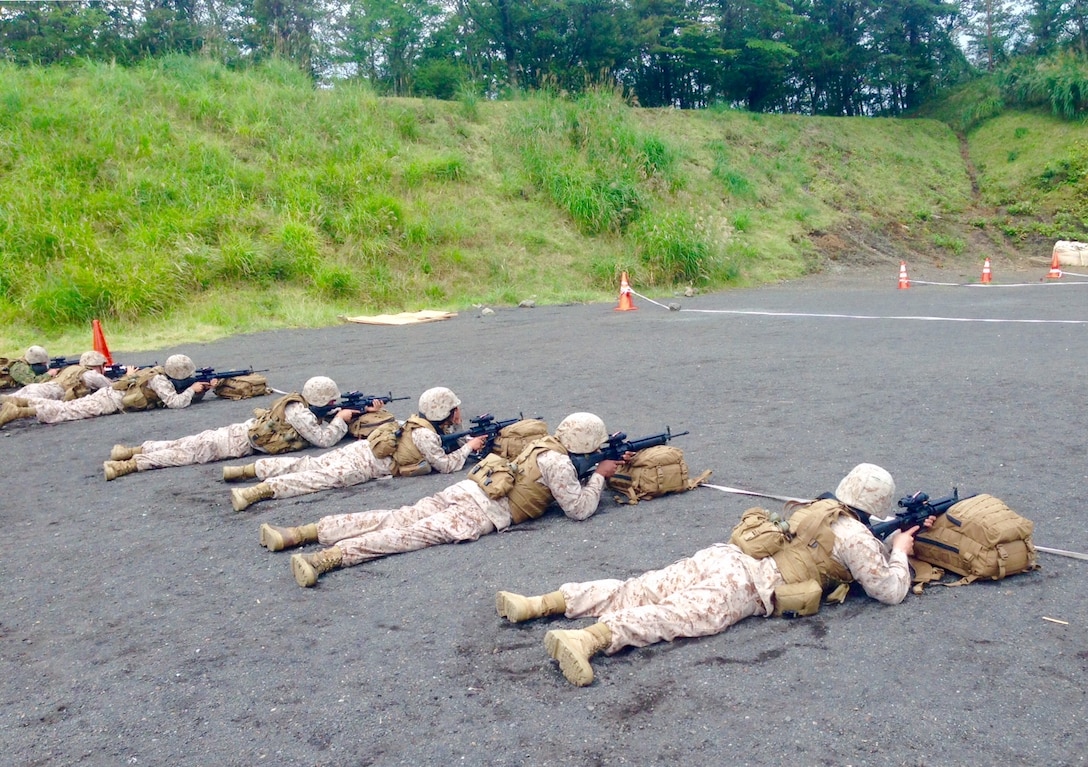 Marines and Sailors of Headquarters and Support Company, Camp Fuji, Japan conduct a Battlesight Zero with their M16A4s. The purpose of the range was to certify Marines on their individual weapon systems and maintain currency in basic military skills.