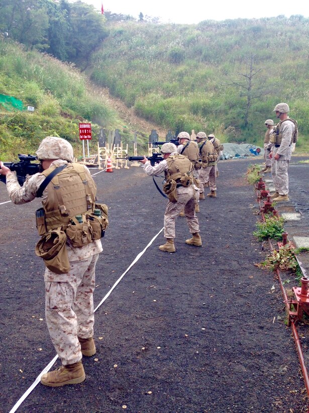 Marine and Sailors of Headquarters and Support Company, Camp Fuji, Japan conduct the Table 3 course of fire with their M16A4s. The purpose of the range was to certify Marines on their individual weapon systems and maintain currency in basic military skills.