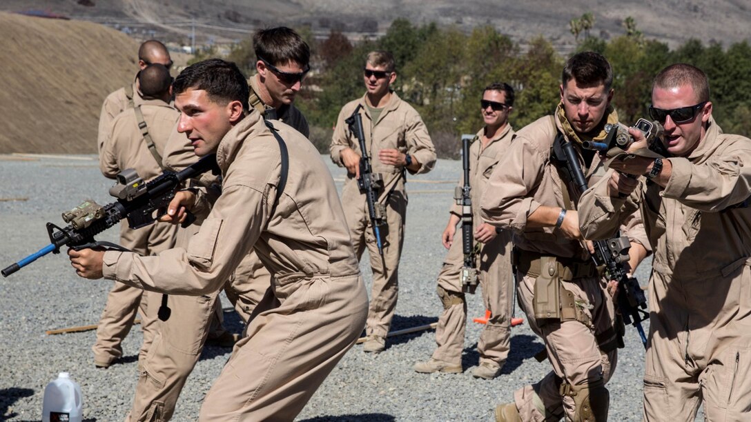 U.S. Marines with Bravo Company, 1st Reconnaissance Battalion, practice clearing rooms during a close-quarters tactics course aboard Camp Pendleton, Calif., Sept. 25, 2014. These Marines are enhancing their skills before compositing with the 15th Marine Expeditionary Unit in October. 