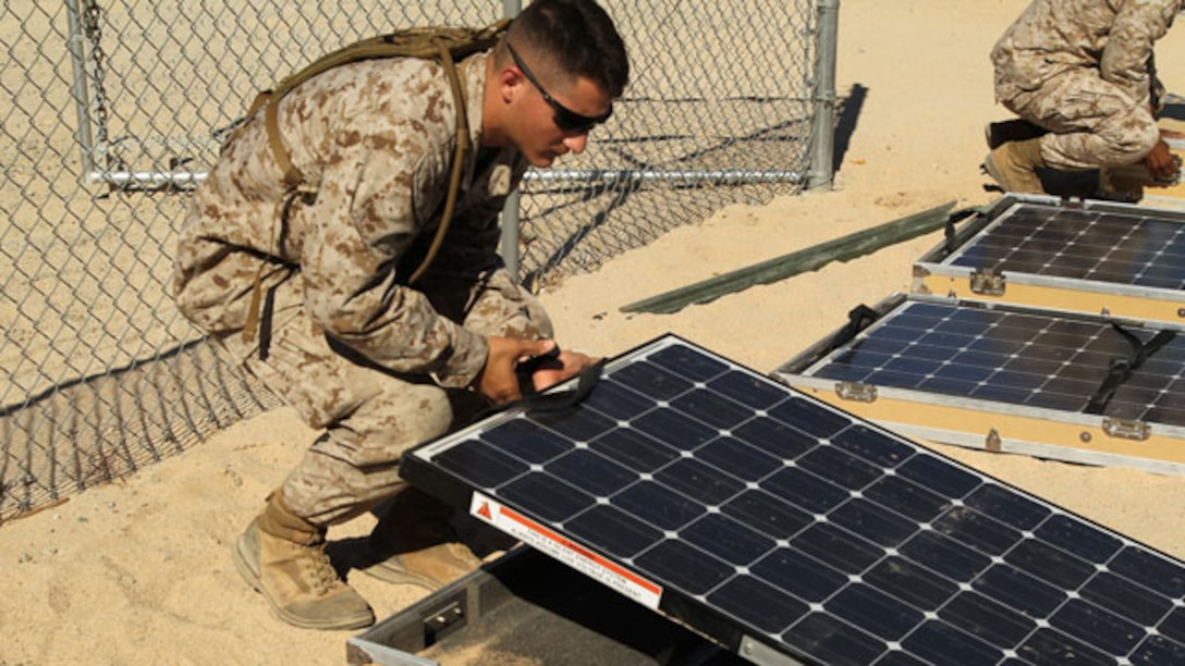 In preparation of Javelin Thrust 2012, Marines from Marine Forces Reserve and 2nd Tank Battalion, learn to setup and operate the Ground Renewable Expeditionary Energy Network System and the Solar Portable Alternative Communications Energy System during a training session conducted by personnel from Marine Forces Pacific Experimentation Center June 28, 2012. (Official US Marine Corps photo by Diane Durden / Released)