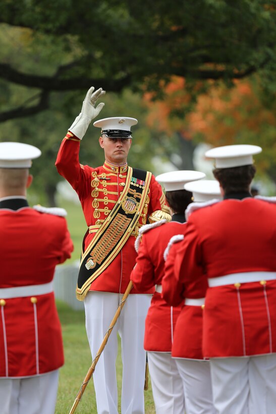 On Sept. 30, 2014, Marines from Marine Barracks Washington participated in the funeral for Major Kurt Chew-Een Lee, USMC (ret.) at Arlington National Cemetery. Major Lee was the first Asian-American Marine Corps officer and a legendary hero at the Battle of Chosin Reservoir during the Korean War. His exploits later became the subject of the Smithsonian Channel's documentary "Uncommon Courage: Breakout at Chosin." Pictured, Drum Major Gunnery Sgt. Duane King. (U.S. Marine Corps photo by Gunnery Sgt. Amanda Simmons/released)
