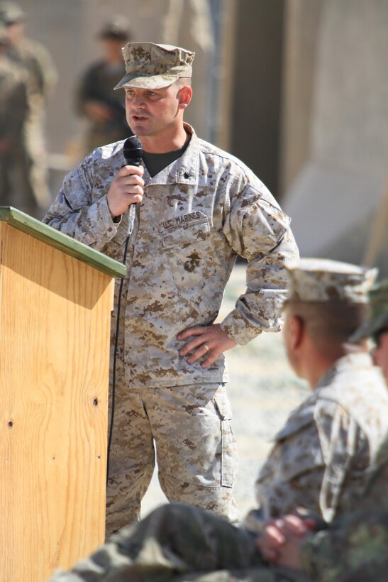 Lieutenant Col. Seth Yost, right, commanding officer, 1st Battalion, 7th Marines, speaks during a transfer of authority ceremony aboard Tactical Base Dwyer, Afghanistan, Oct. 1, 2014. “It’s been a memorable deployment for 1st Battalion, 7th Marines. It’s been inspiring to have been here as we help to write the final chapter of the Marine Corps’ presence in Helmand province,” Yost said.