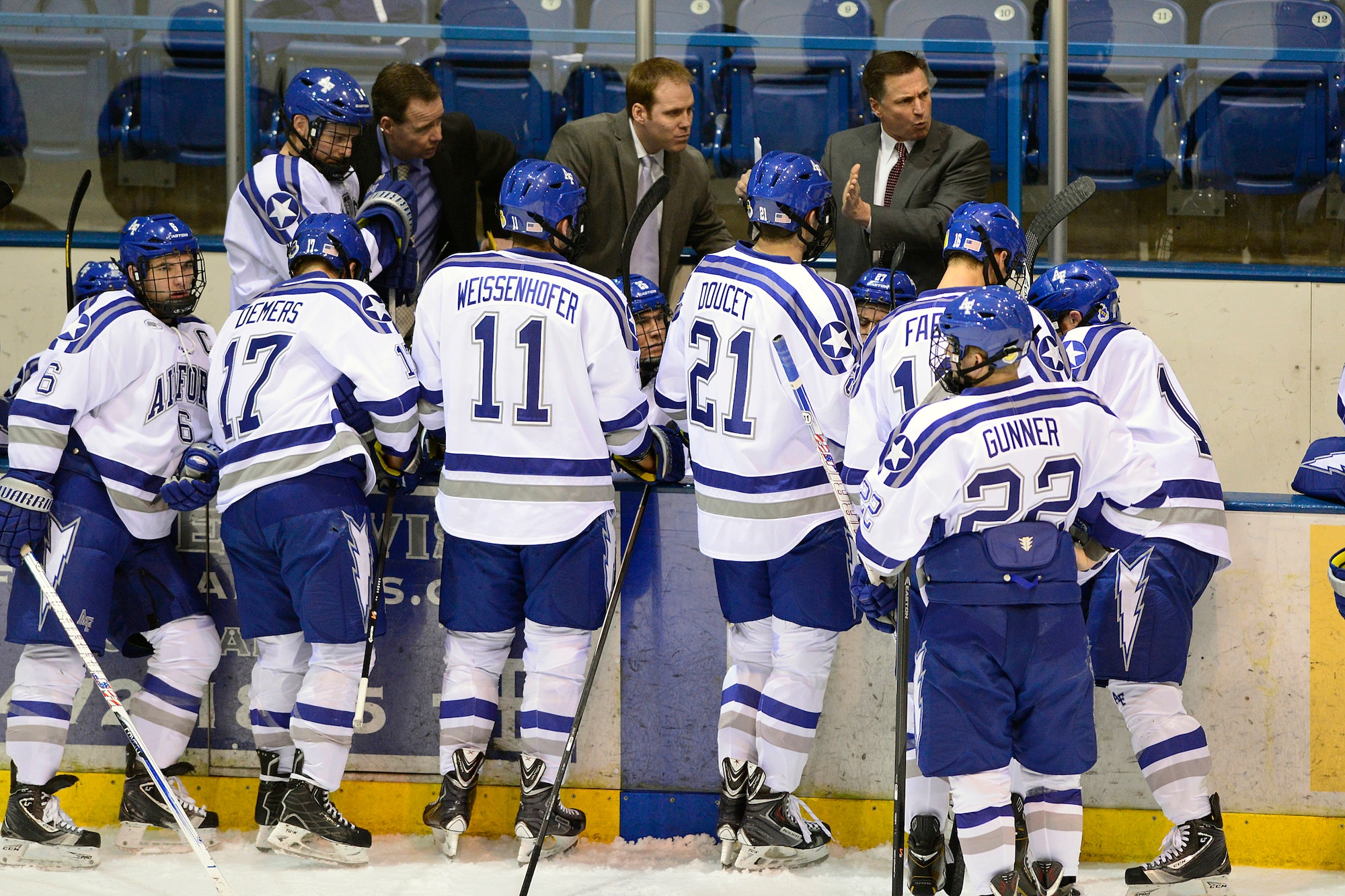 Falcon Ice Hockey head coach Frank Serratore  (right) talks to his team
during a match at the Cadet Ice Arena. Serratore said the competitive
athlete understands the meaning of leadership and the attributes they gain
in competition -- service before self, caring for others and leading front
the front -- help them effectively manage their other responsibilities.
(U.S. Air Force photo/Mike Kaplan)  
