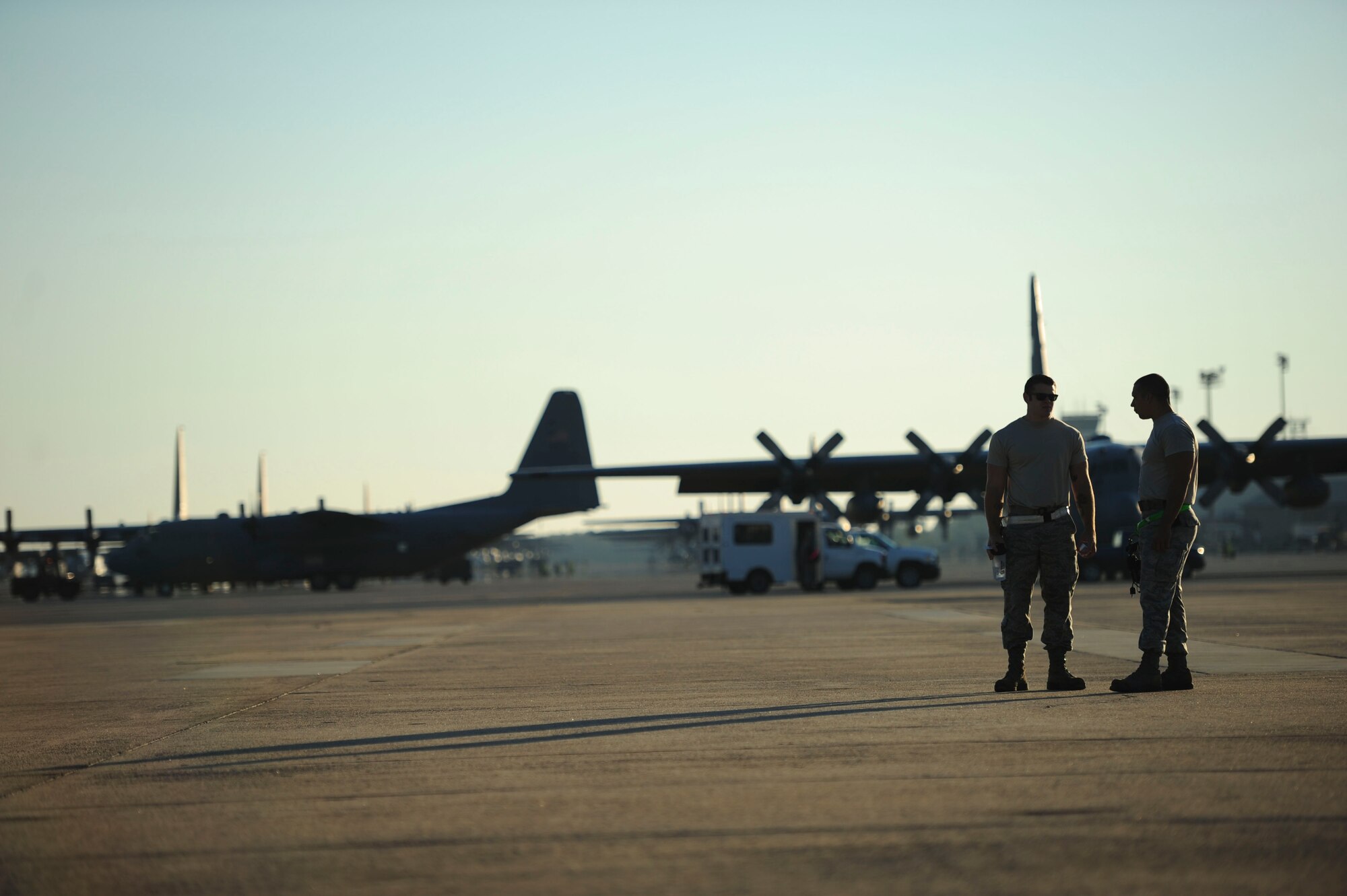 Airmen from the 19th Aircraft Maintenance Squadron discuss maintenance operations Sept. 29, 2014, at Little Rock Air Force Base, Ark. Little Rock AFB is home to approximately 25 percent of the total U.S. Air Force C-130 fleet. (U.S. Air Force photo by Senior Airman Kaylee Clark)