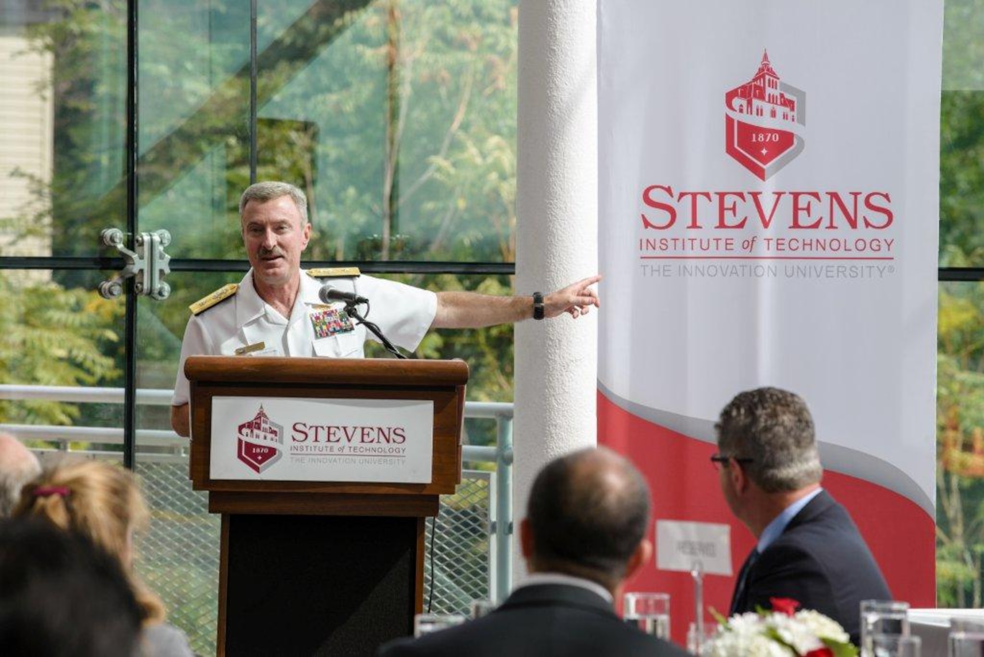 Rear Adm. Mark Darrah, Naval Air Warfare Center, Aircraft Division commander, addresses attendees at an educational partnership signing ceremony hosted at Stevens Institute of Technology in Hoboken, N.J., Sept. 24, 2014. (Courtesy photo)