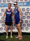 (Left to right) Airman 1st Class Andrew Riesenberger and Staff Sgt. Joshua Johnson, Osan Air Base, Republic of Korea, participate in the Air Force Half Marathon, Wright-Patterson Air Force Base, Ohio, Sept. 20, 2014. Riesenberger and Johnson were part of the Pacific Air Forces team that won 1st place in the half marathon Major Command team challenge. (Courtesy photo from Lois Johnson)