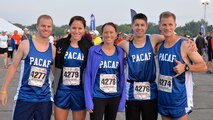 (Left to right) Airman 1st Class Andrew Riesenberger, Osan Air Base, Republic of Korea; Senior Airman Lauren Weimer, Joint Base Pearl Harbor-Hickam, Hawaii; Capt. Allison Easterly, Joint Base Elmendorf-Richardson, Alaska; Staff Sgt. Joshua Johnson, Osan AB; and Chaplain (Col) Dondi Costin, Headquarters Pacific Air Forces, Hawaii, participate in the Air Force Half Marathon, Wright-Patterson Air Force Base, Ohio, Sept. 20, 2014. The PACAF team won 1st place in the half marathon Major Command team challenge. (Courtesy photo from Lois Johnson)