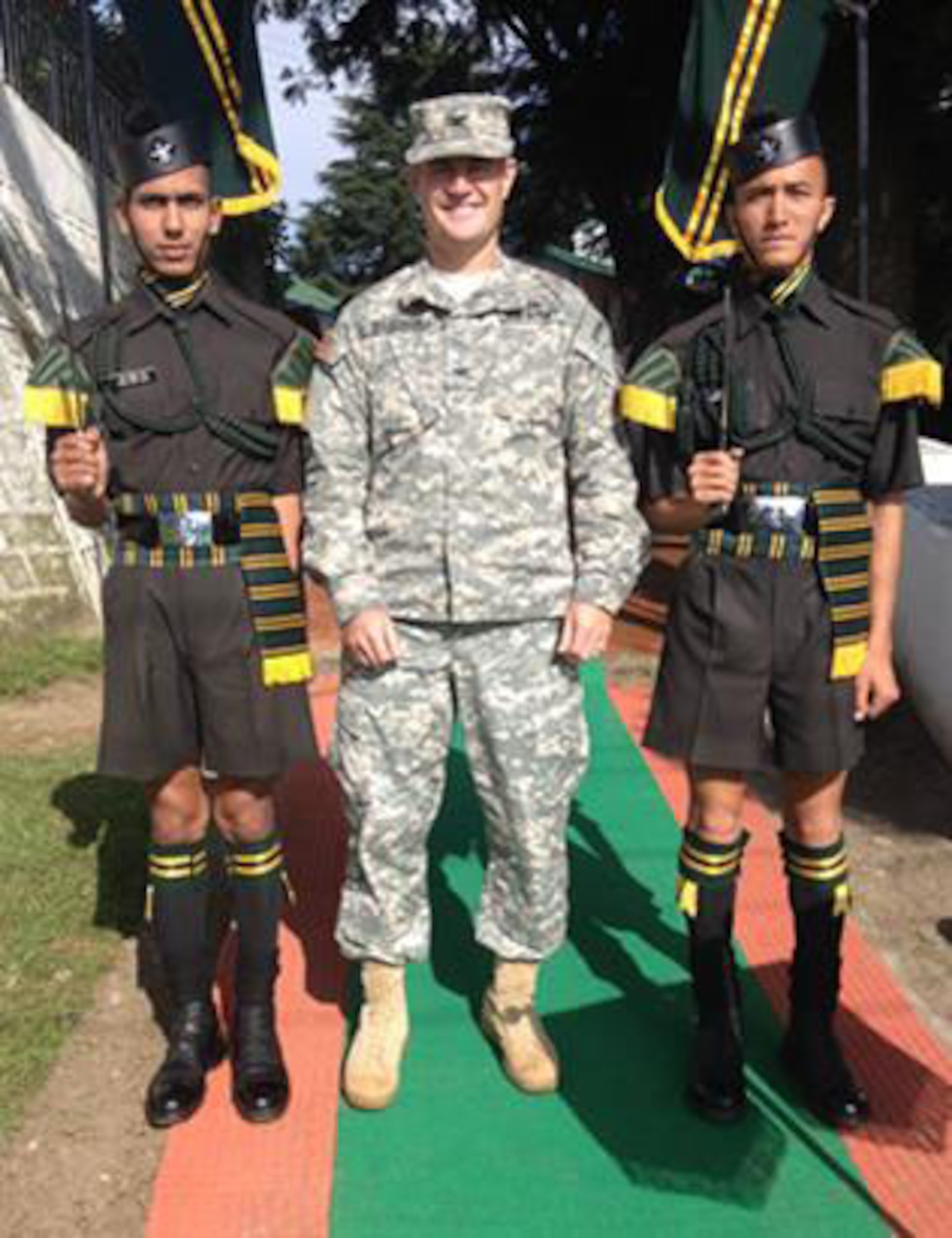 Col. James C. Bulkowski, 3rd Brigade Atlantic Division, 75th Training Command, at Joint Base McGuire-Dix-Lakehurst, N.J., poses with Indian Army guards at Ranikhet Cantonment, India. (Photo by Col. Steve Buethe/Released)
