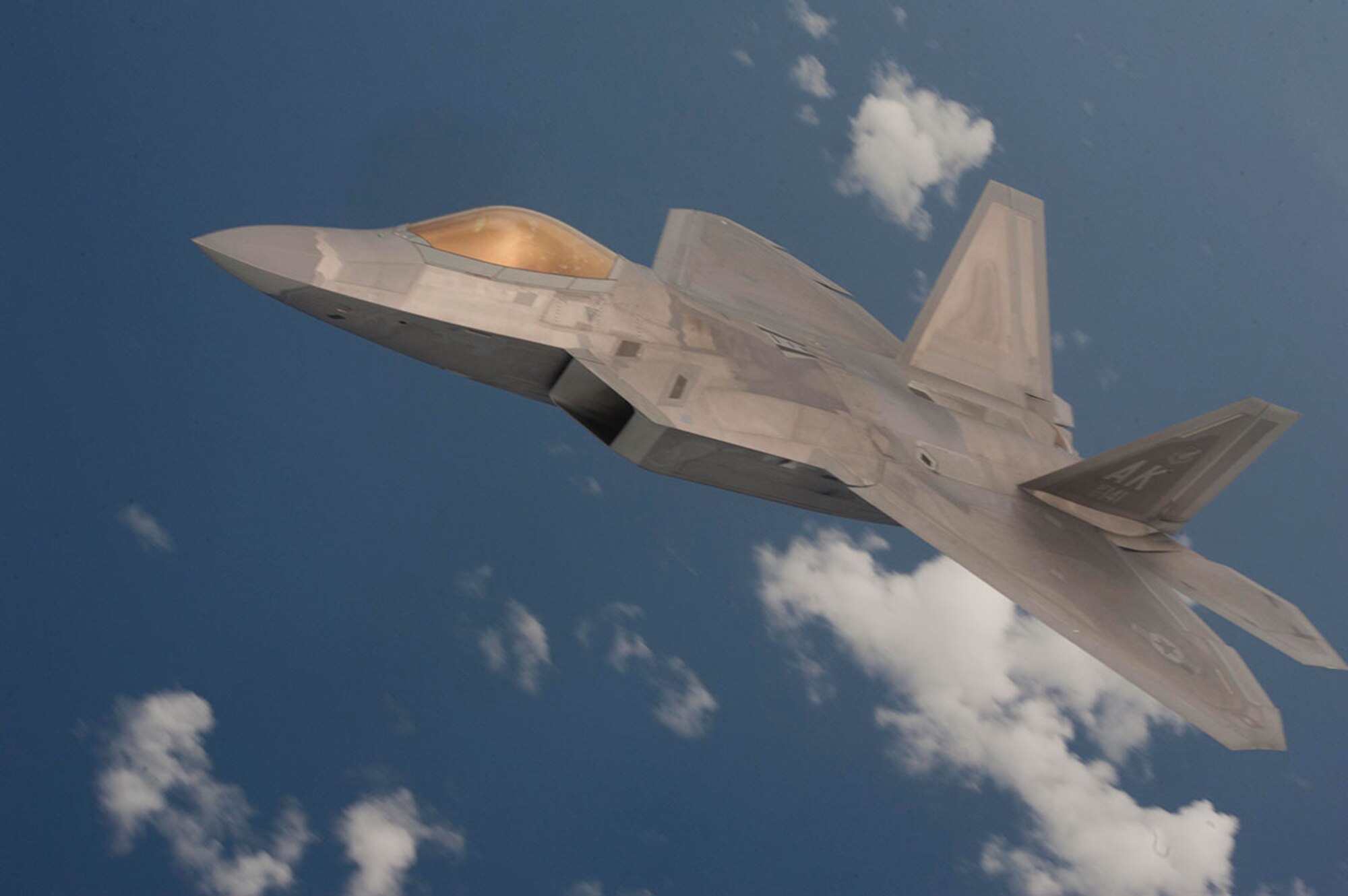 PACIFIC OCEAN ( 19 Sept. 2014) -- A U.S. Air Force F-22 Raptor from the 90th Fighter Squadron from Joint Base Elmendorf Richardson prepares to refuel from a KC-135 Stratotanker during exercise Valiant Shield, Sept. 19, 2014.Valiant Shield is a U.S.-only exercise integrating and estimated 18,000 Navy, Air Force, Army and Marine Corps personnel, more than 200 aircraft and 19 surface ships, offering real-world joint operational experience to develop capabilities that provide a full range of options to defend U.S. interests and those of its allies and partners.