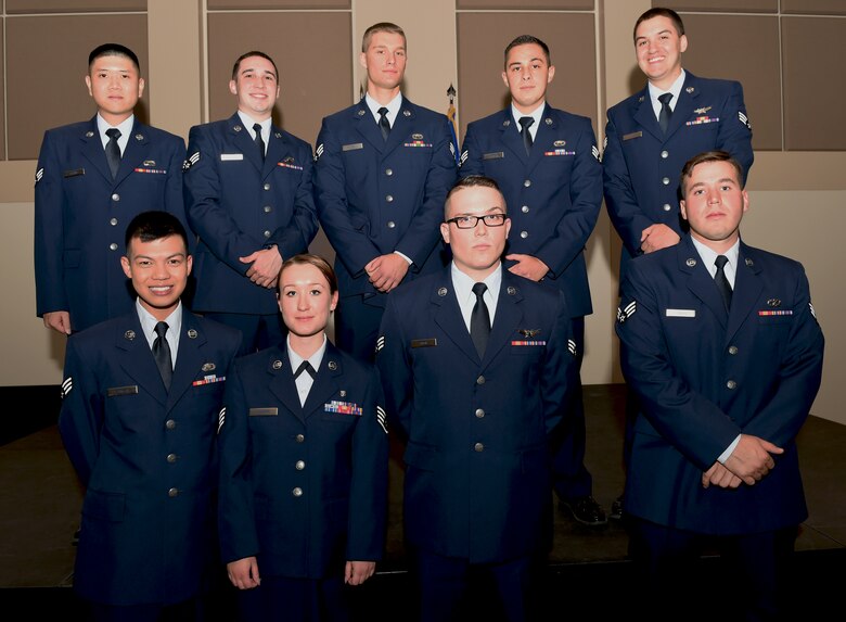 Nine Team Buckley members were promoted Oct. 1, 2014, at the Leadership Development Center on Buckley Air Force Base, Colo. A promotion ceremony is a time-honored tradition in the Air Force, allowing co-workers, family and friends to support and congratulate Airmen on their promotion. (U.S. Air Force photo by Airman 1st Class Samantha Saulsbury/Released)