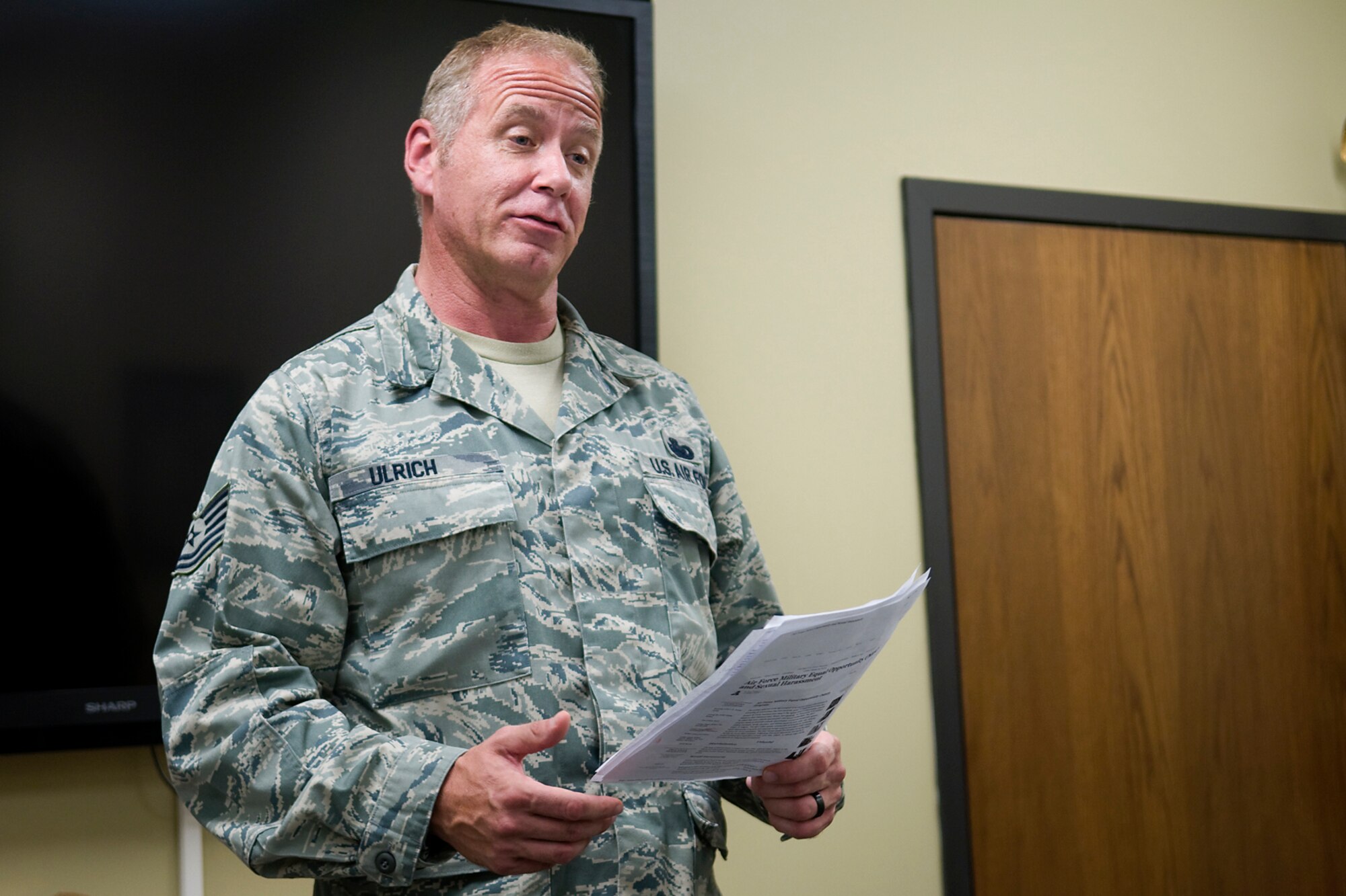 Tech. Sgt. John Ulrich, 434th Logistics Readiness Squadron supply management journeyman, delivers a speech to the his fellow classmates at an Air Force Reserve Noncommissioned Officer Leadership Development Course graduation ceremony at Grissom Air Reserve Base, Ind., Sept. 19, 2014. The 10-day course combined college level management and leadership instruction with a military practical, experimental and hands-on application. (U.S. Air Force photo/Mark R. W. Orders-Woempner)
