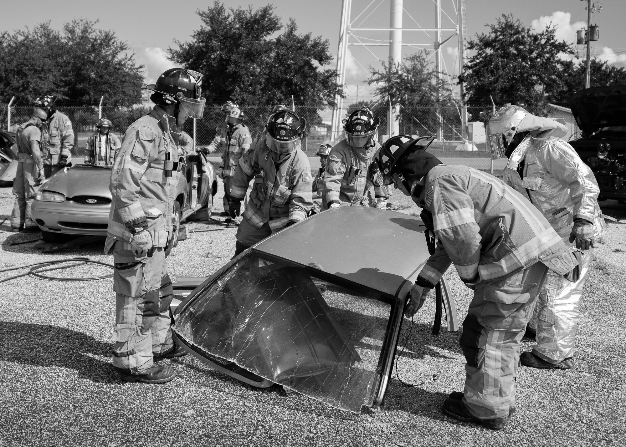 Firefighters from the 96th Test Wing set down a car roof after removing it during a car extraction training exercise at Duke Field, Fla., Sept. 10.  The day crew of Fire Station 4 took part in the exercise to meet their training requirement.  National Fire Prevention Week began Oct. 5.  Eglin firefighters have various activities planned throughout the week.   (U.S. Air Force photo/Tech. Sgt. Sam King)