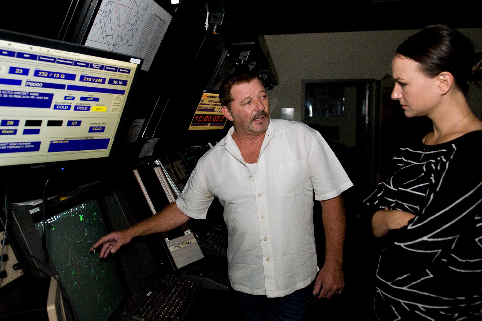 Craig Littrell, 434th Operations Support Squadron air traffic control supervisor shows Rachel Lipsey, military legislative assistant for Sen. Joe Donnelly, the air space Grissom ATC manages during her tour at Grissom Air Reserve Base, Ind., Sept. 4, 2014. Grissom ATC manages all commercial, civilian and military air traffic between Chicago and Indianapolis, going as far west as Lafayette, Ind., up to 10,000 feet. (U.S. Air Force photo/Mark R. W. Orders-Woempner)