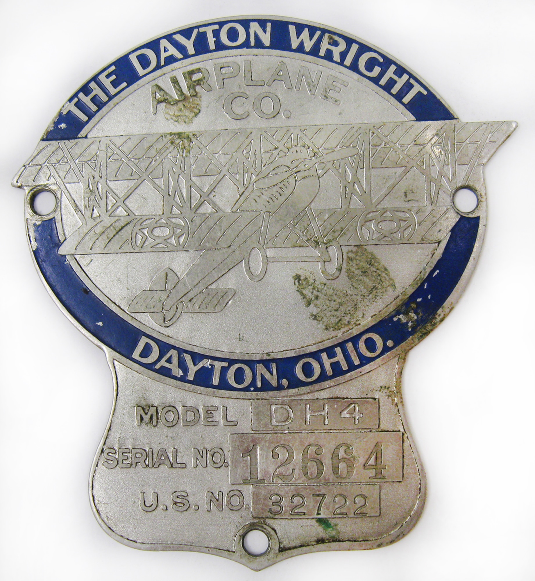 This is a data plate from a DH-4 aircraft with the serial number 12664, U.S. number 32722, and made by The Dayton Wright Airplane Co. in Dayton, Ohio. Per donor, this DH-4 data plate was brought home by the donor's father who served in France during WWI servicing aircraft;  the DH-4 that this data plate came from was damaged and later destroyed. The DH-4, modeled after the British DeHavilland design, was the only U.S.-built aircraft to see combat during WWI. (U.S. Air Force photo)
