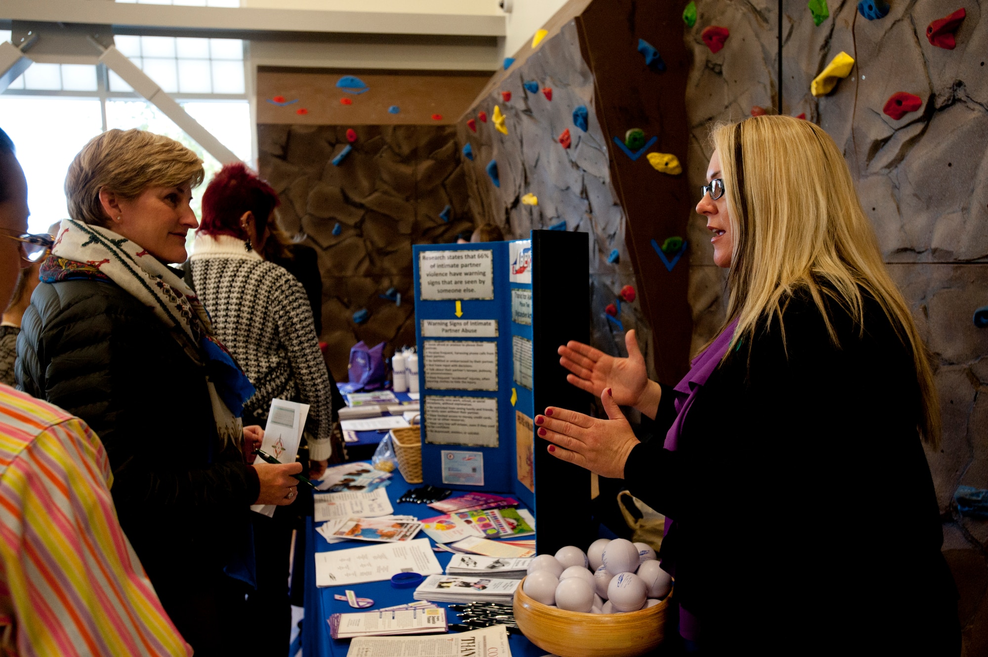 Members of Joint Base Elmendorf-Richardson, Alaska, and the Anchorage community participated in a Domestic Violence Prevention Month opening ceremony at the Covenant House Alaska on Oct. 1, 2014. Awards were presented, stories were shared about domestic violence, materials were provided for additional information on what can be done, and music was shared during the event. (U.S. Air Force photo/Staff Sgt. Robert Barnett)