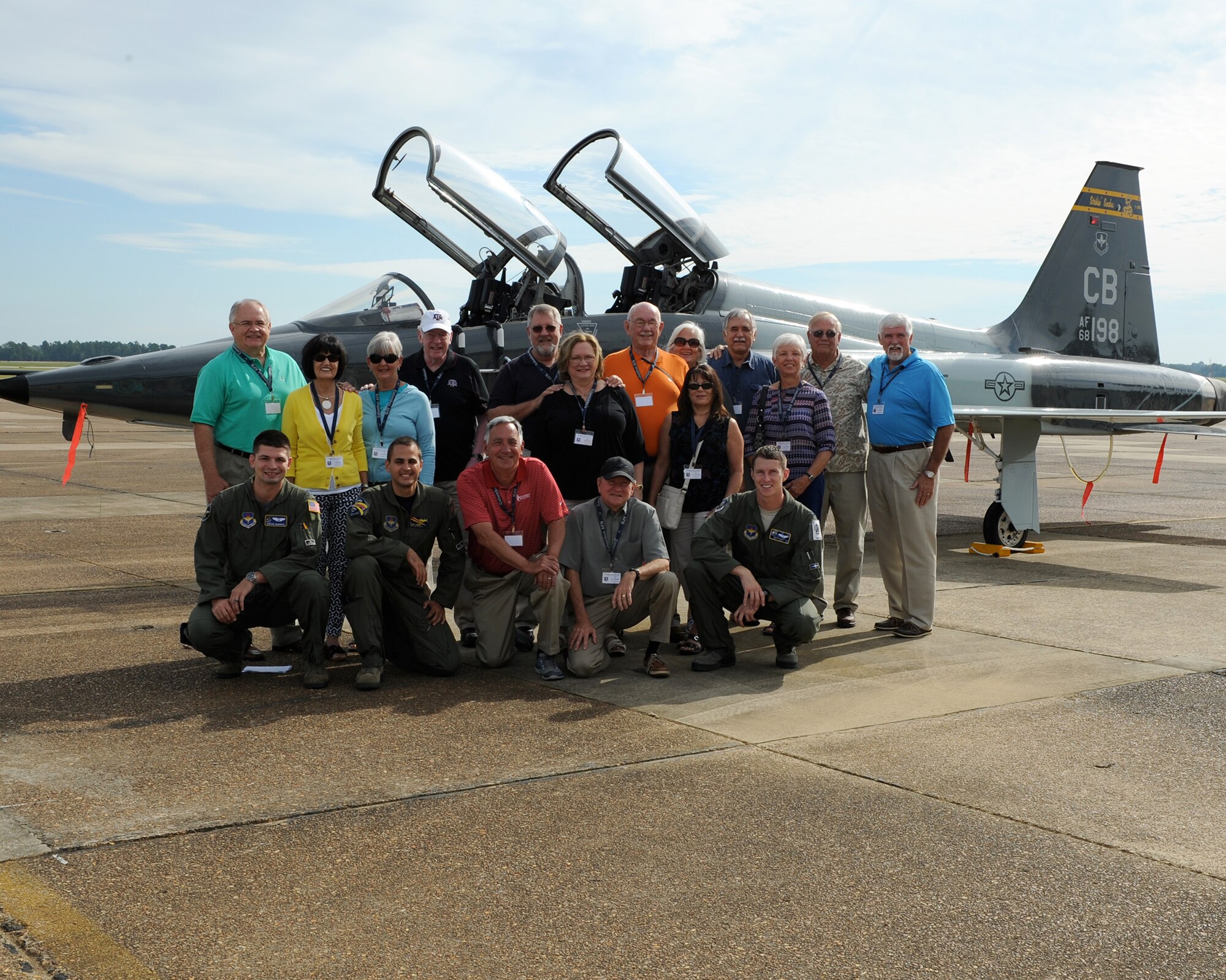 Graduates from Undergraduate Pilot Training Class 74-02 stand next to a T-38 Talon during their reunion at Columbus Air Force Base Sept. 26. Members spent their reunion touring the base and getting reacquainted with their previous classmates. (U.S. Air Force photo/Elizabeth Owens) 